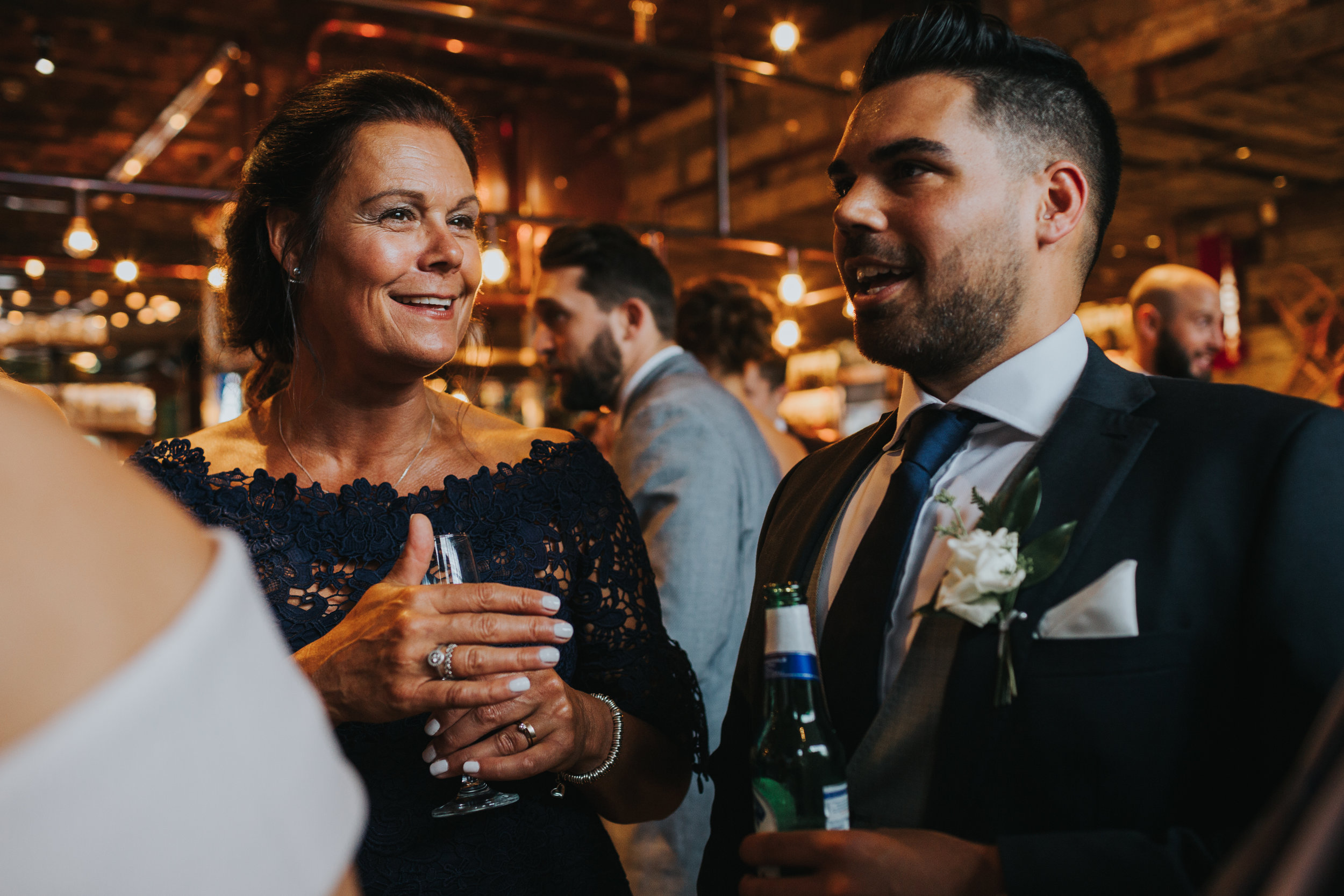 Wedding guests chat in Albert Schloss Manchester