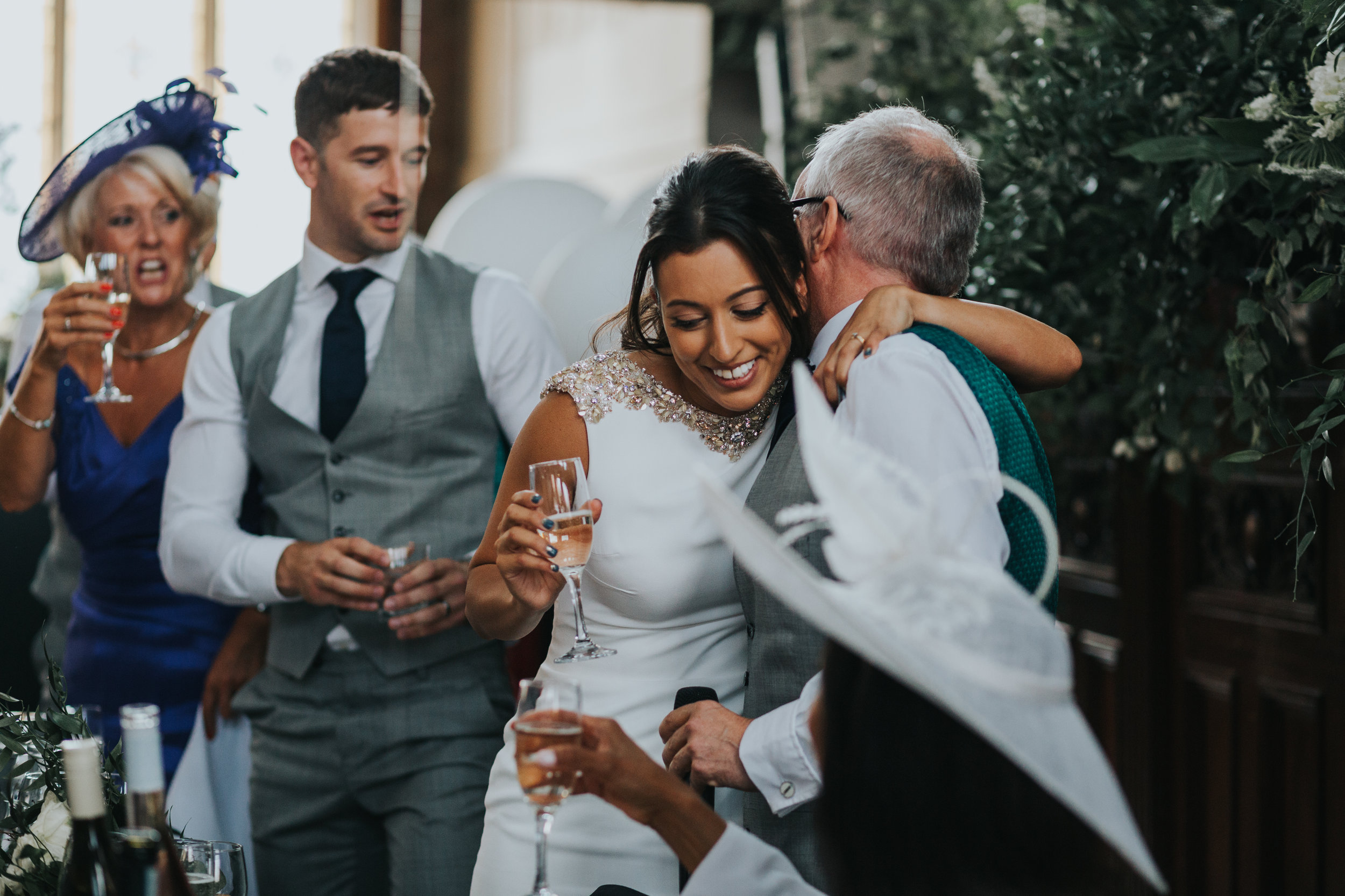 Bride hugs father after his speech