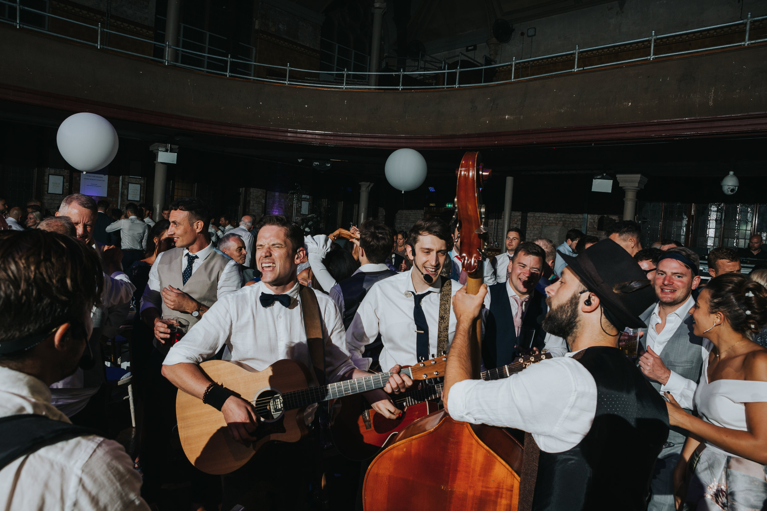 Band play in the middle of the dancing crowd at The Albert Hall, Manchester. 