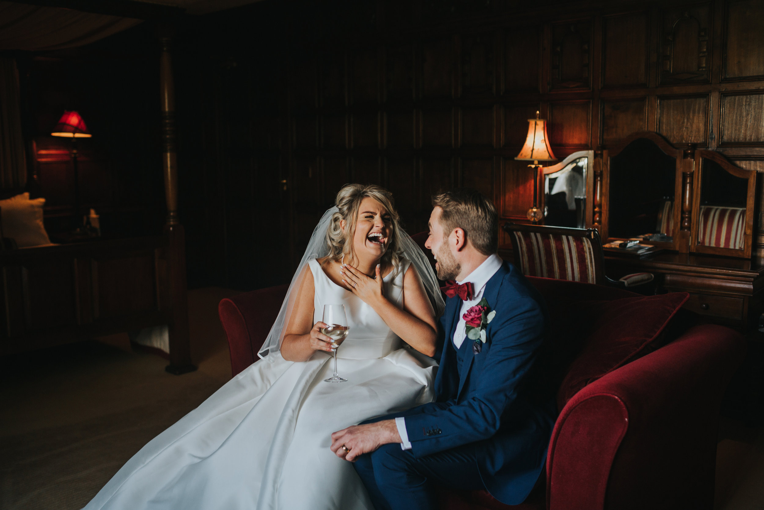 Bride is still laughing at her groom.