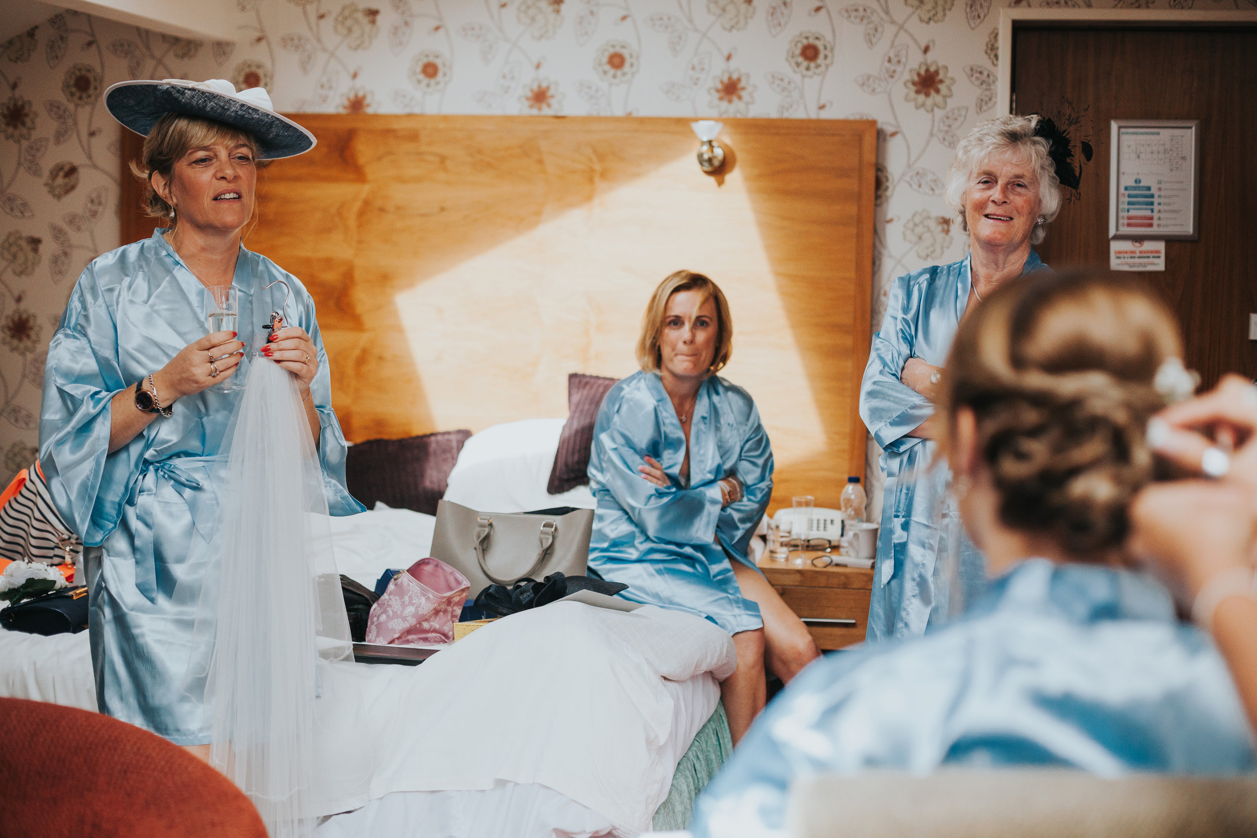 Female family members share a laugh together.