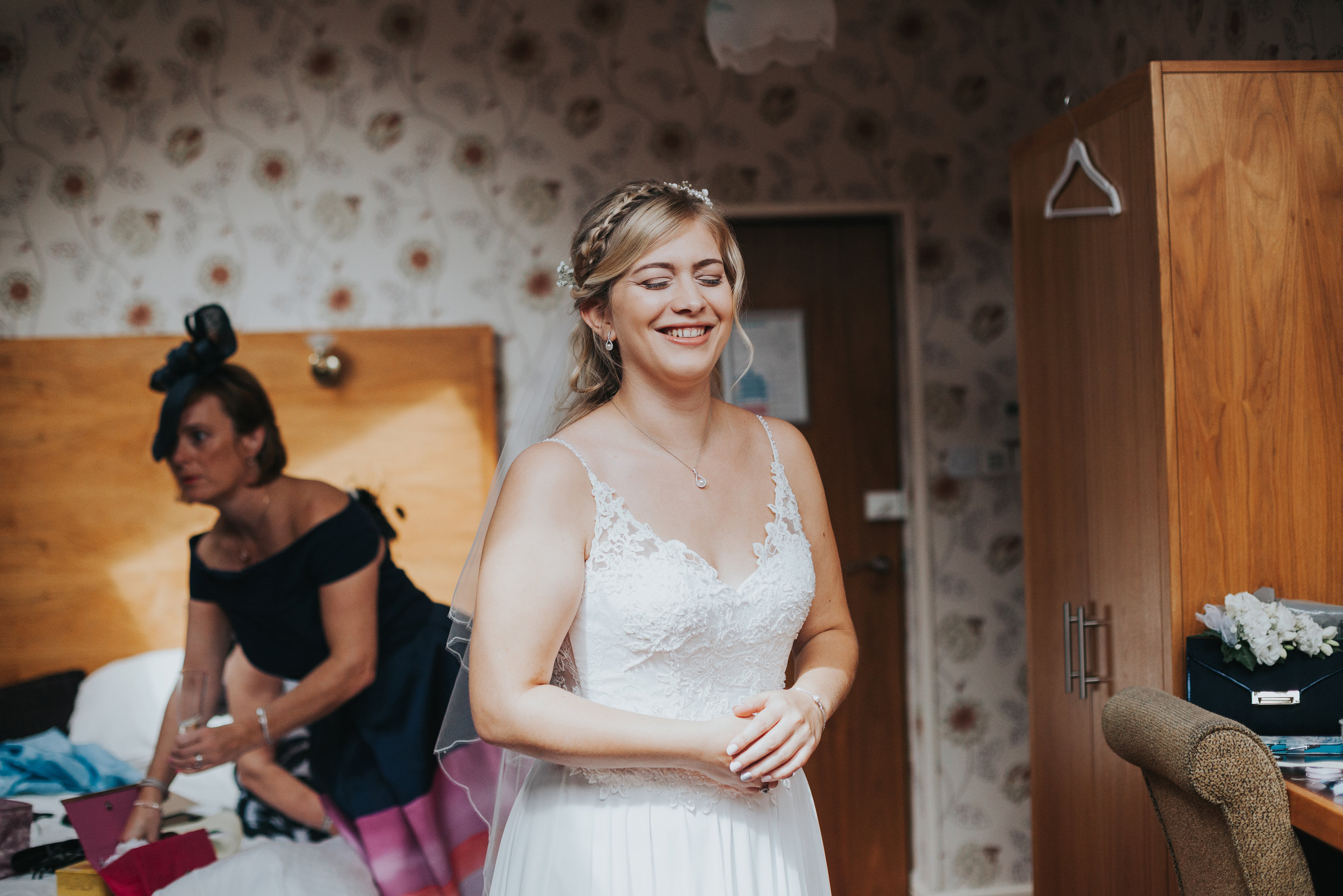 Bride smiling ready to get married at Mytton Fold. 