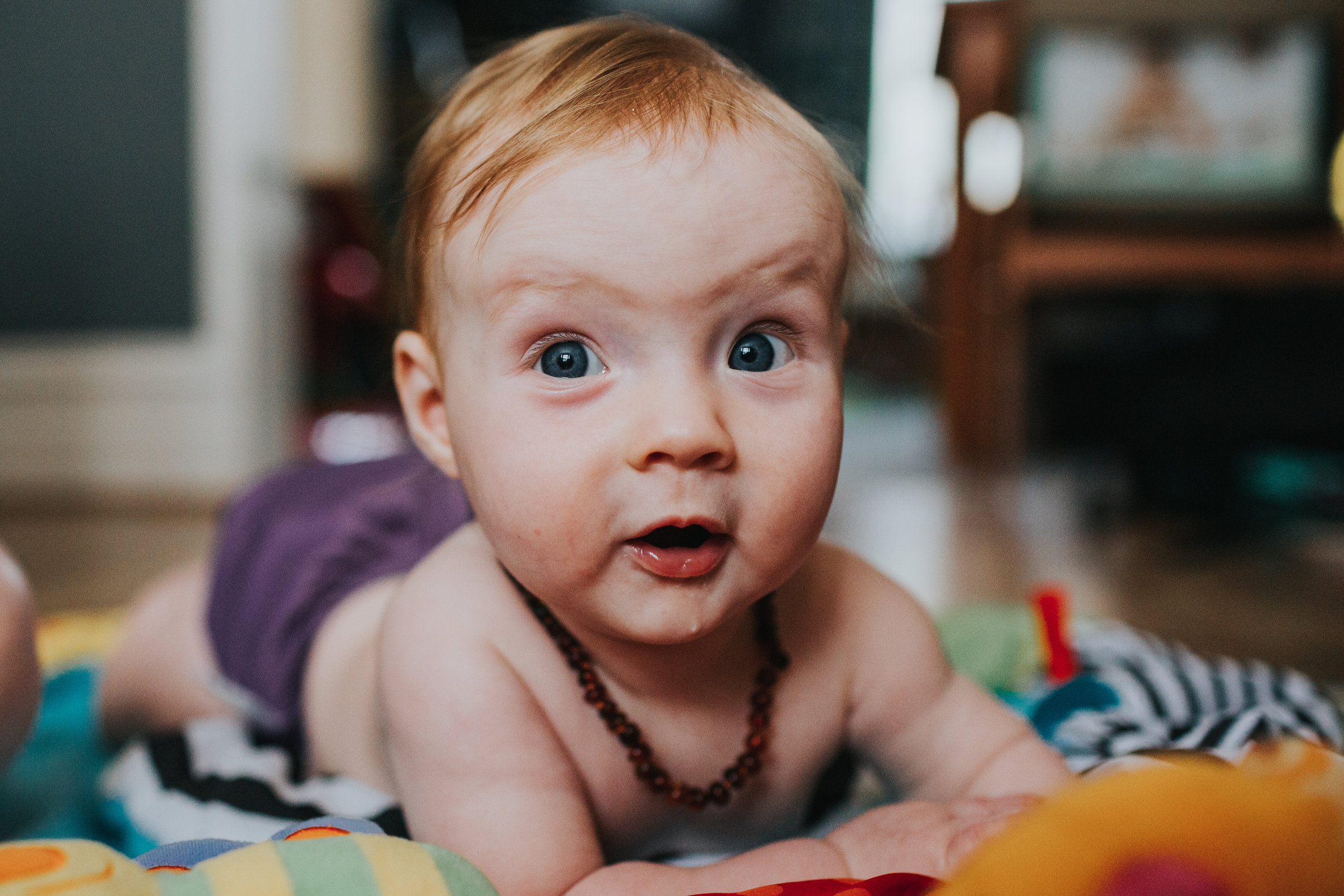 The Liverpudlian baby crawls up to the camera while drooling.