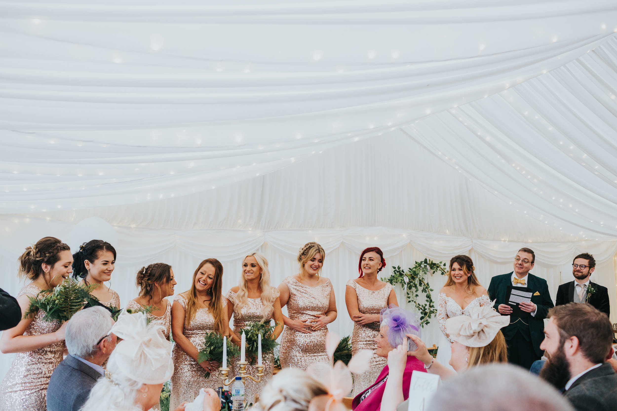 Bridesmaids laughing. 