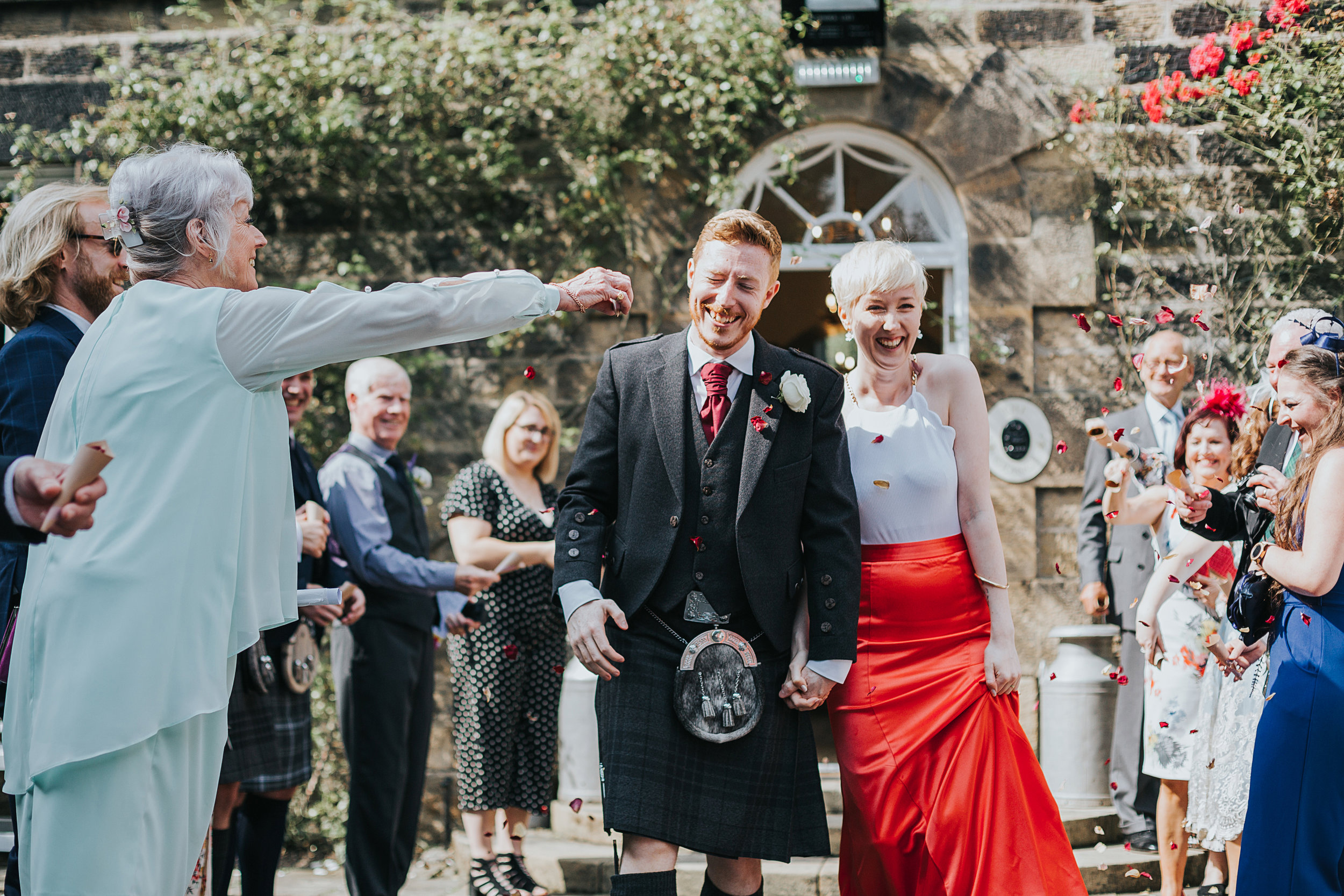 Bride and groom are attacked by confetti and wasps. 