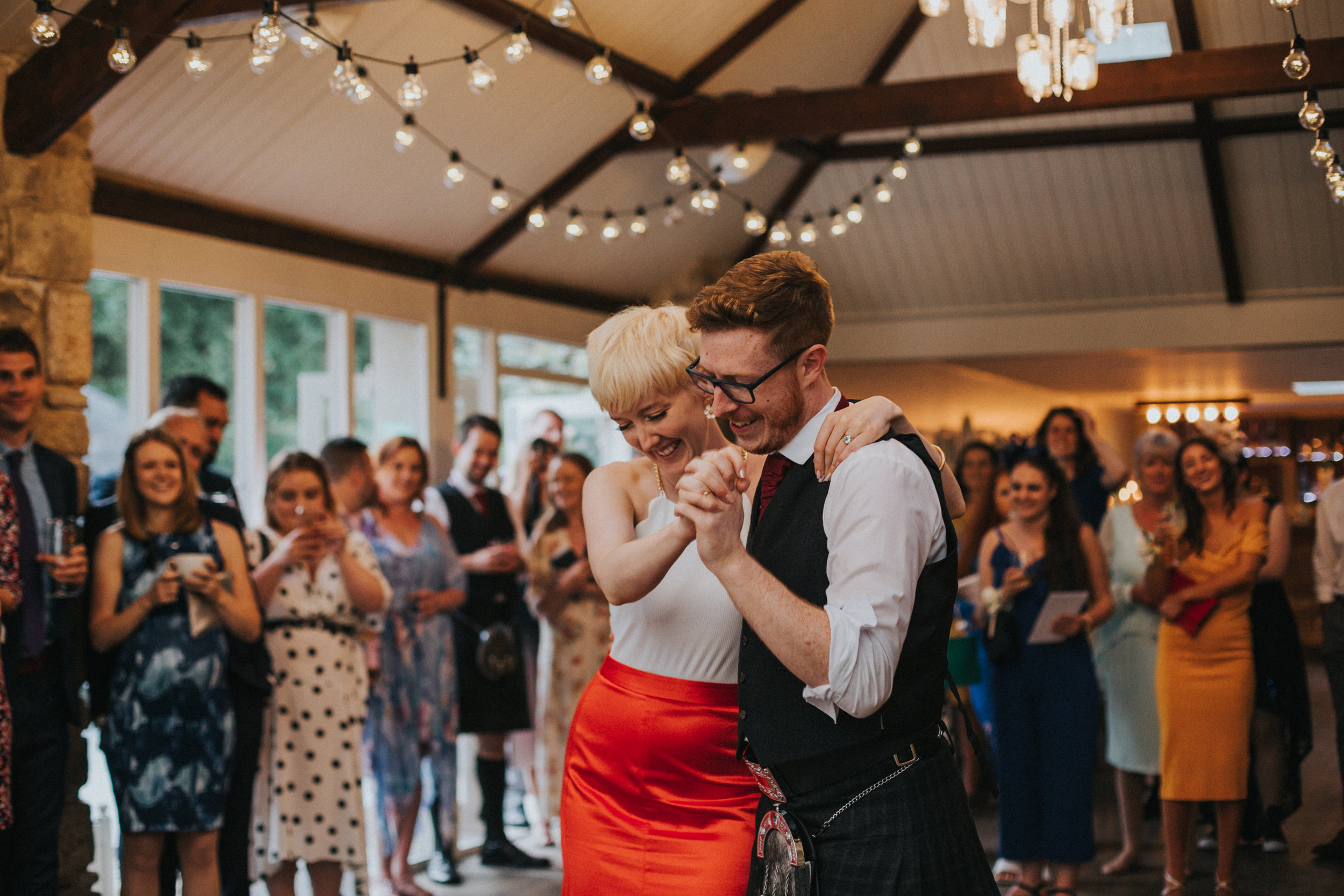 Bride and groom have their first dance. 