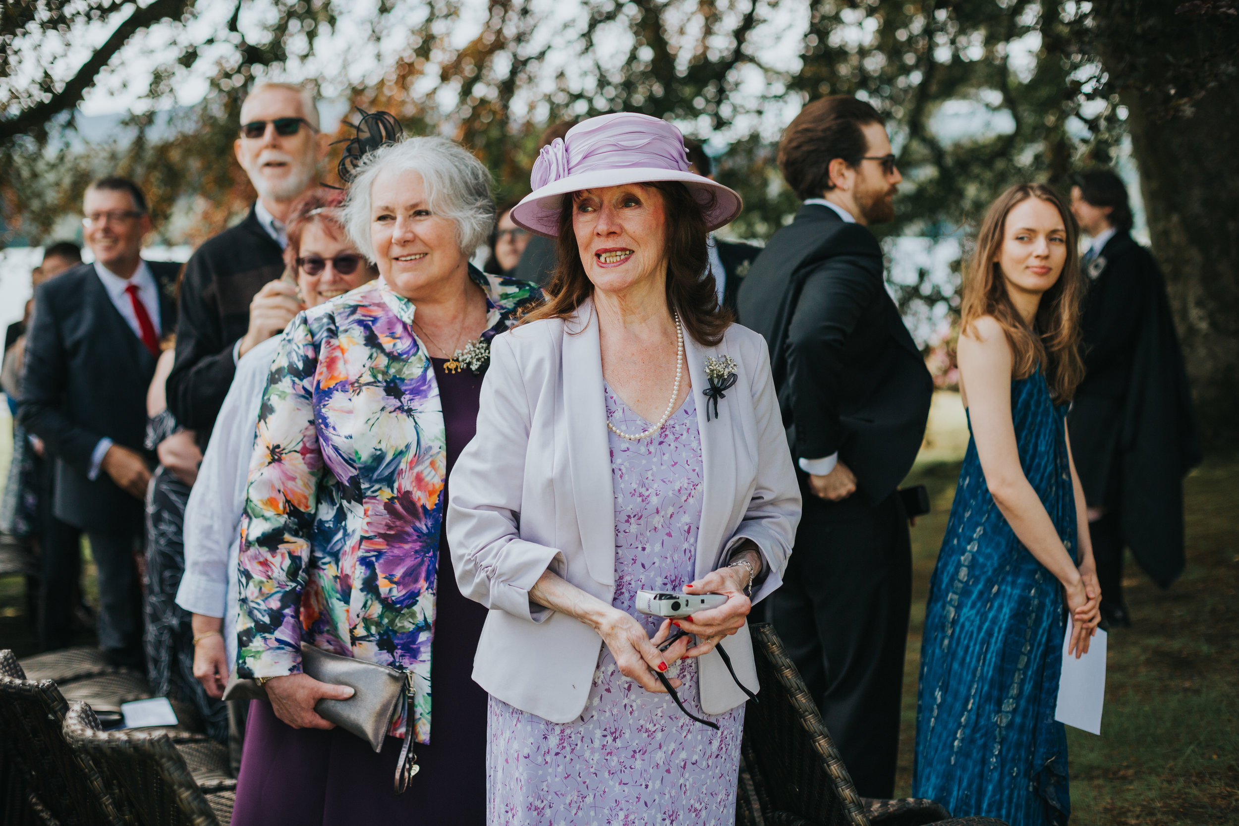 Mother of the bride watches her daughter come down the aisle.