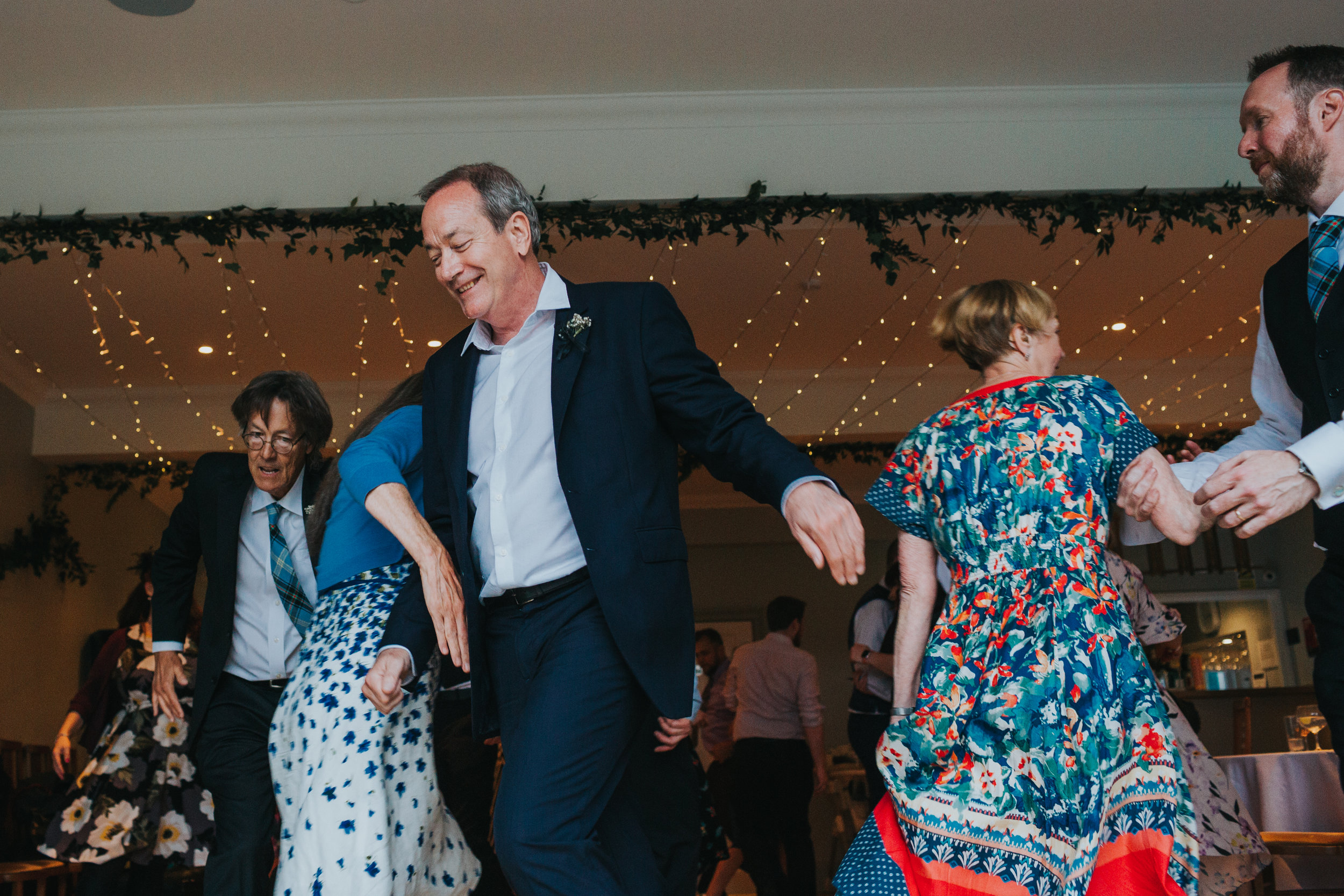 Guests run around the dance floor.