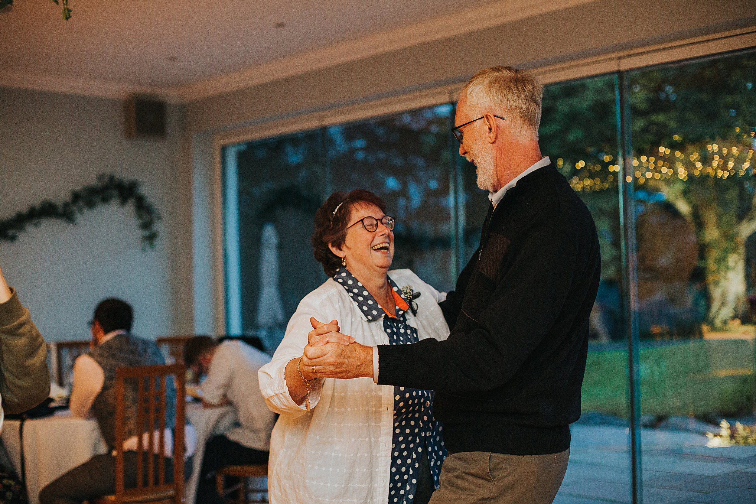 Older couple smiling and having a lovely time together. 