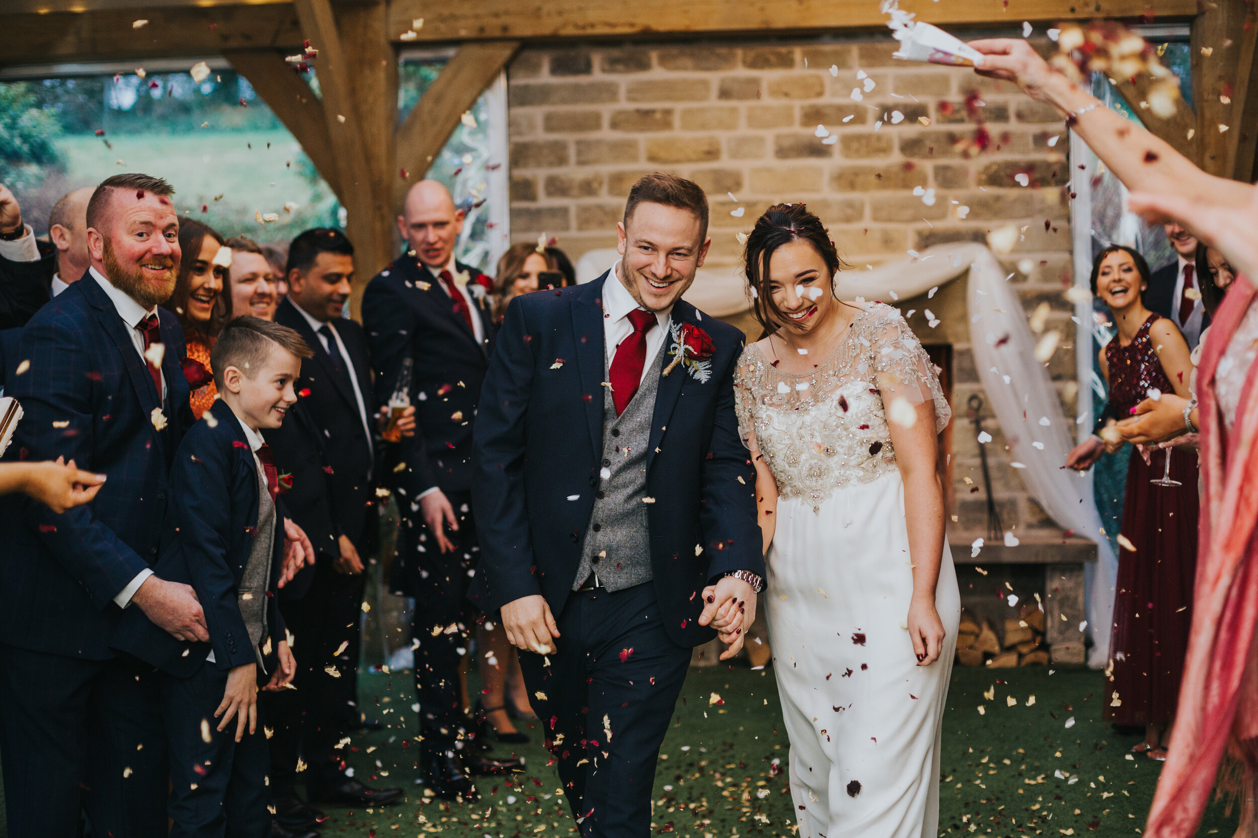 Bride and groom get their confetti indoors at  the White Harty Inn