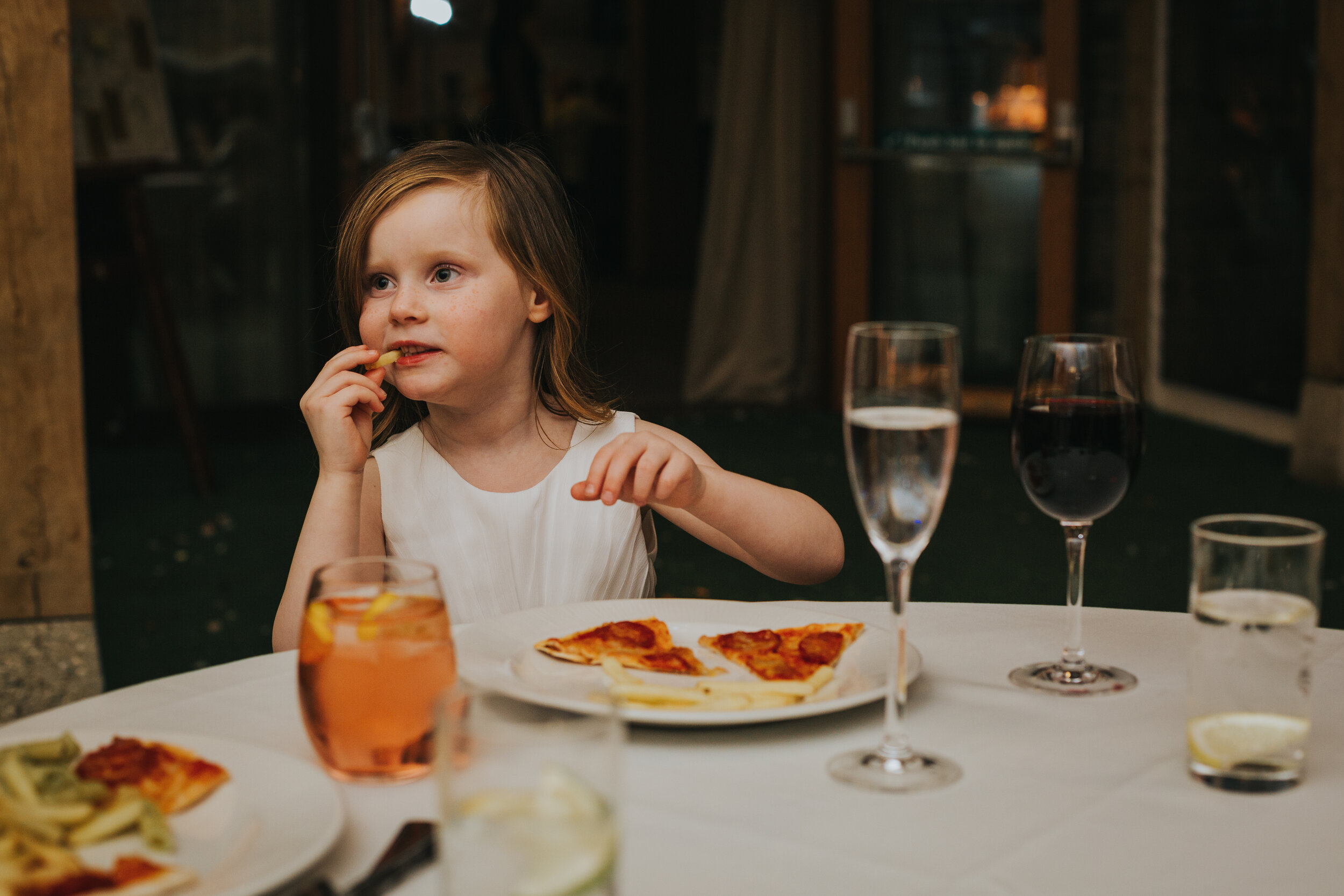 Child eating pizza. 