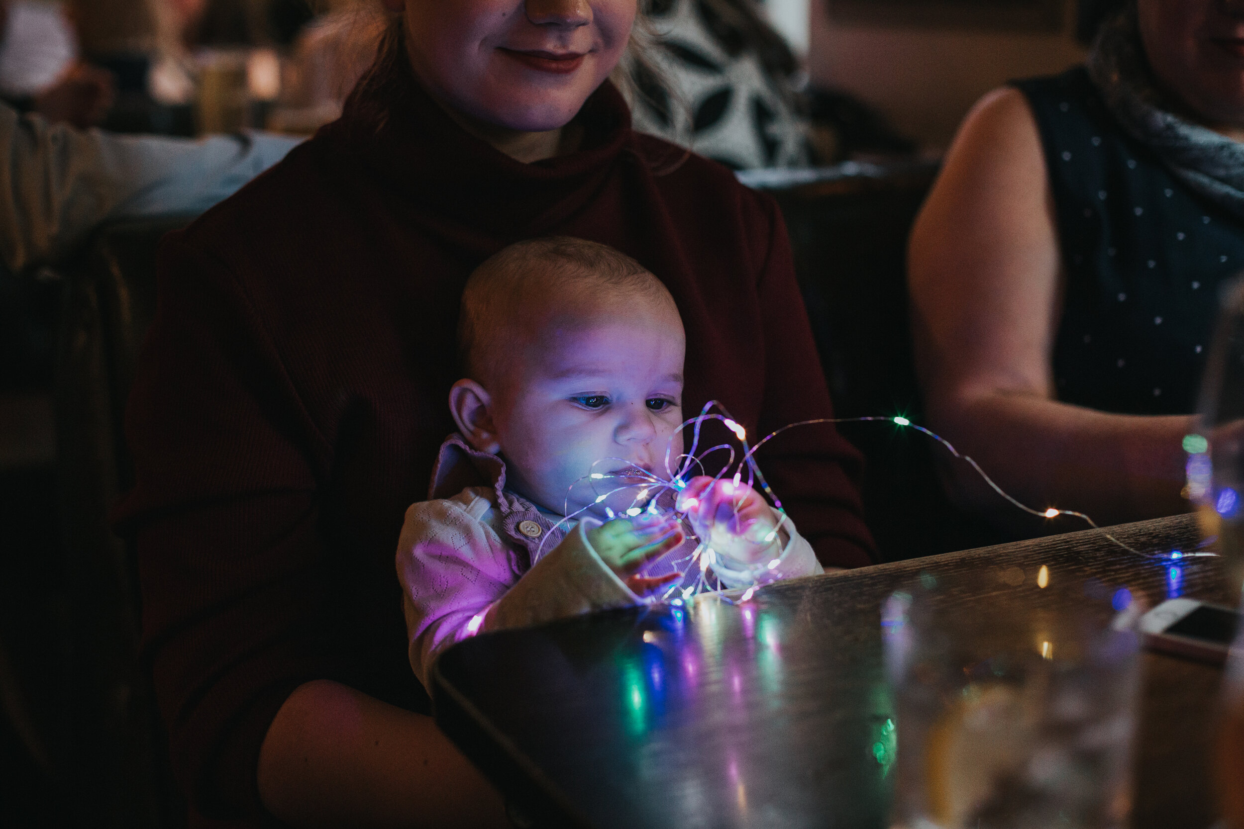 Baby playing with fairy lights.  (Copy)