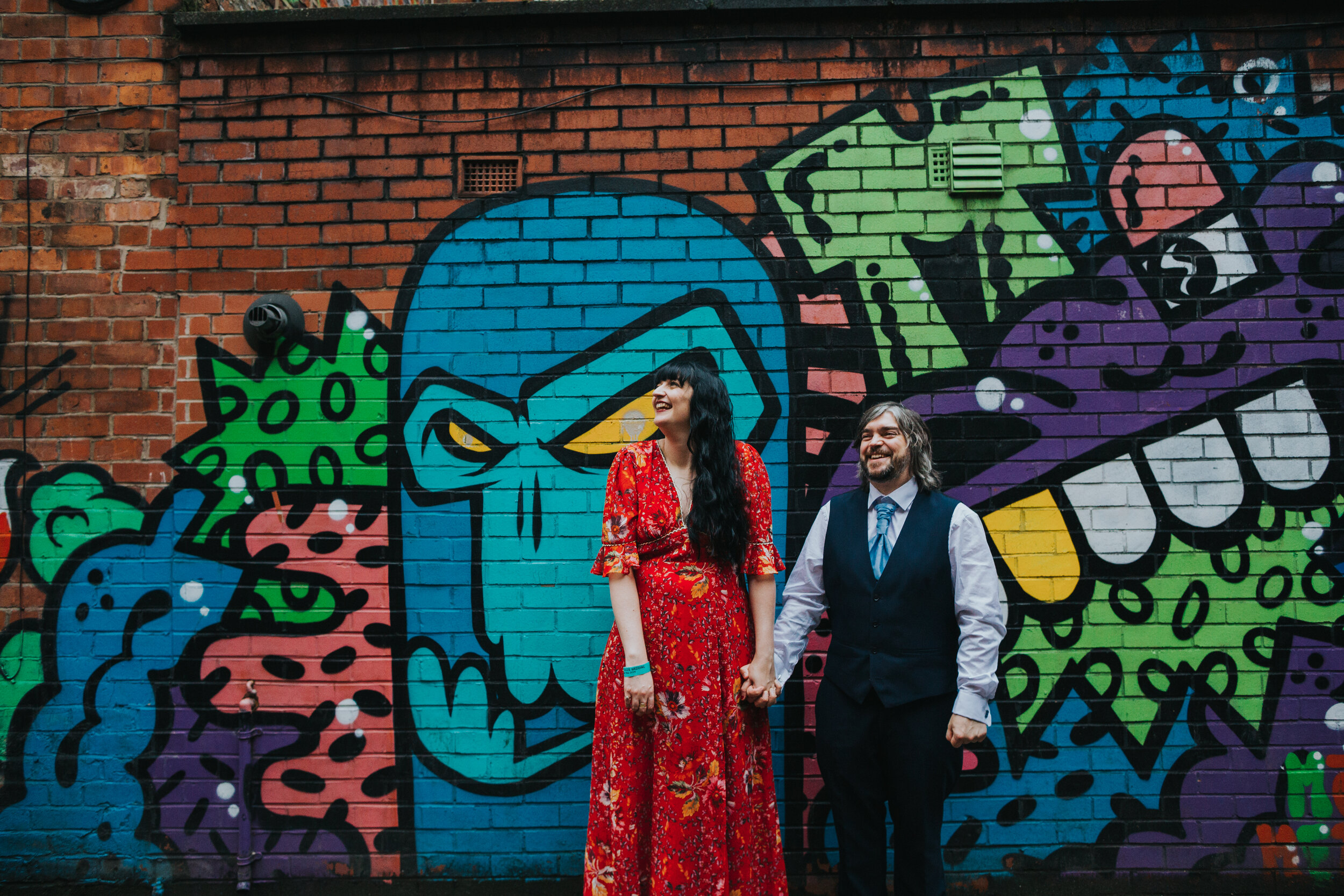 Bride and Groom in front of monkey graffiti in Manchester. (Copy)