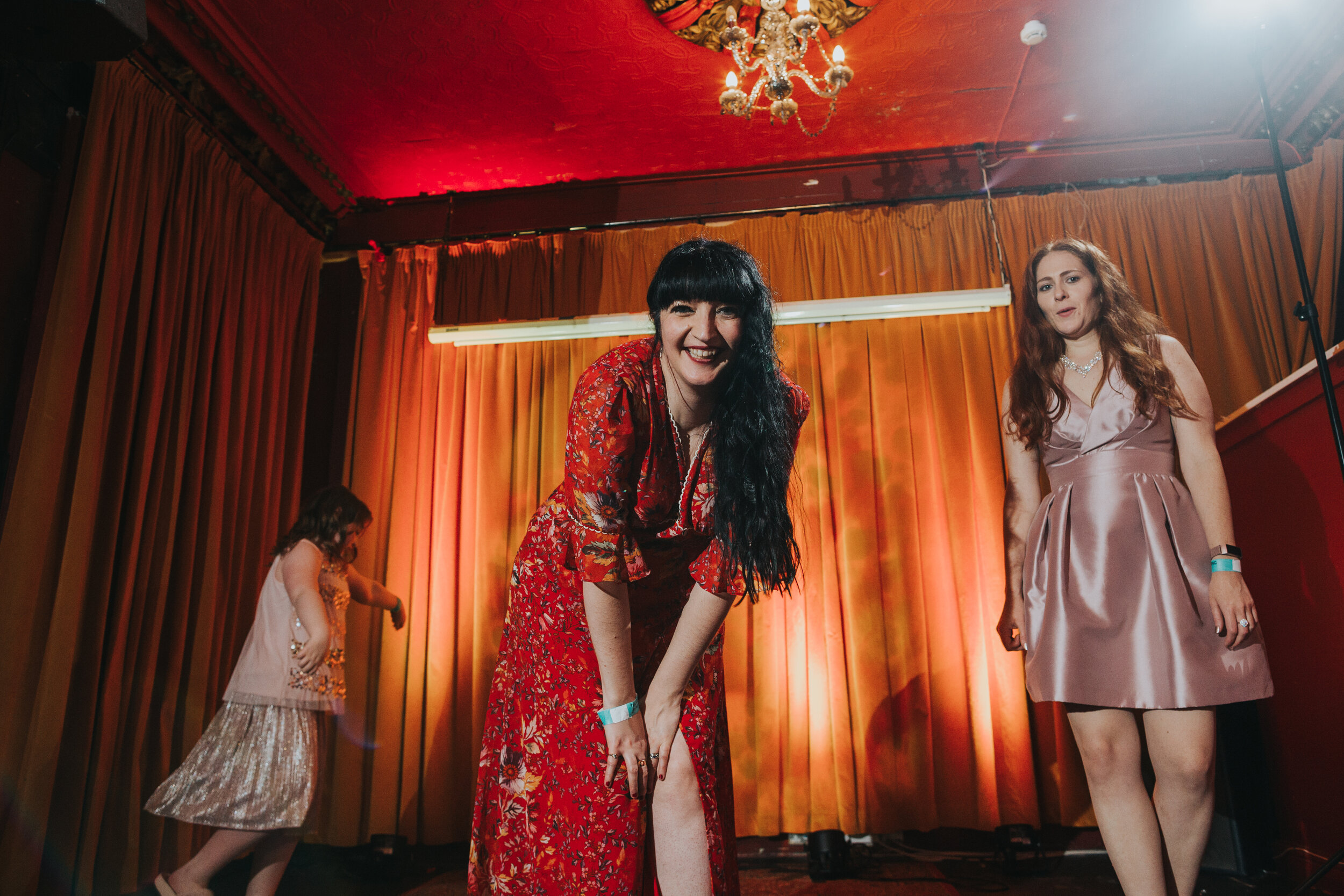 Bride looking amazing in her red wedding dress.  (Copy)