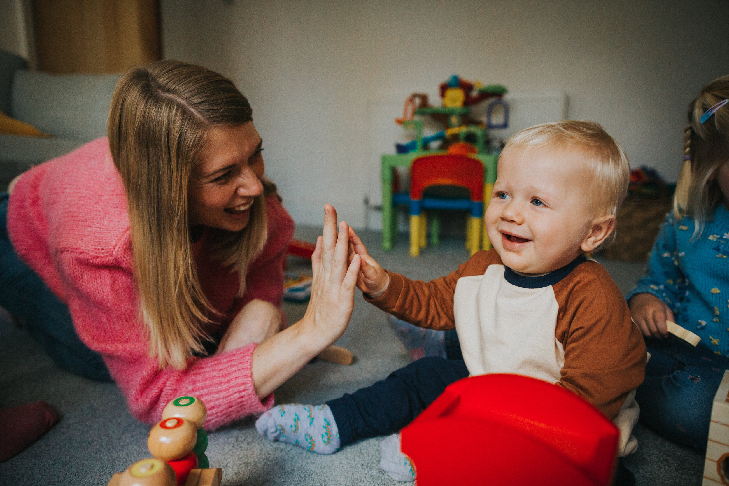 Mum high fives her little boy