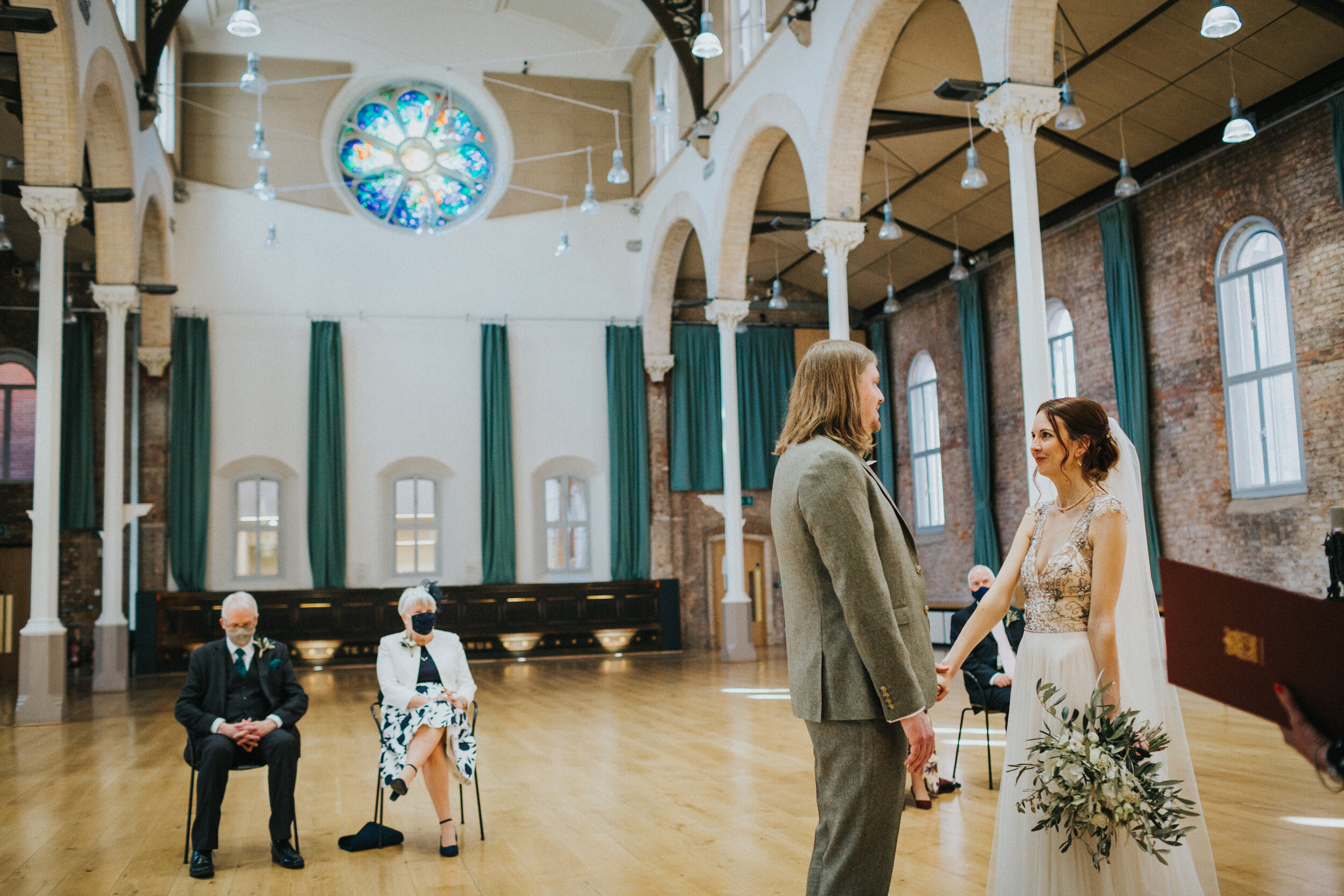 Bride and Groom say their wedding vows in Halle, St Peters, Manchester.