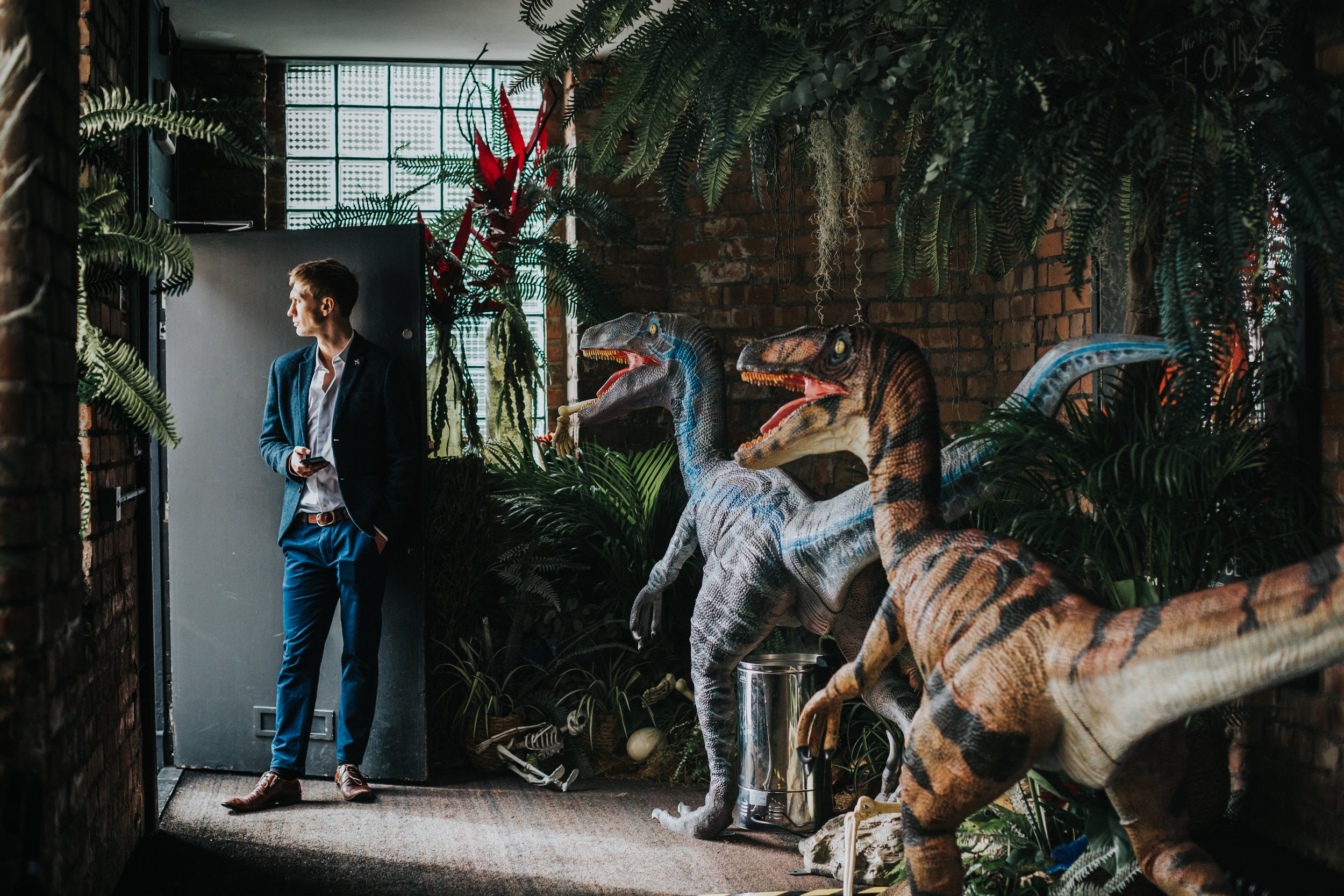 Best man and velociraptors wait for the wedding guests. 