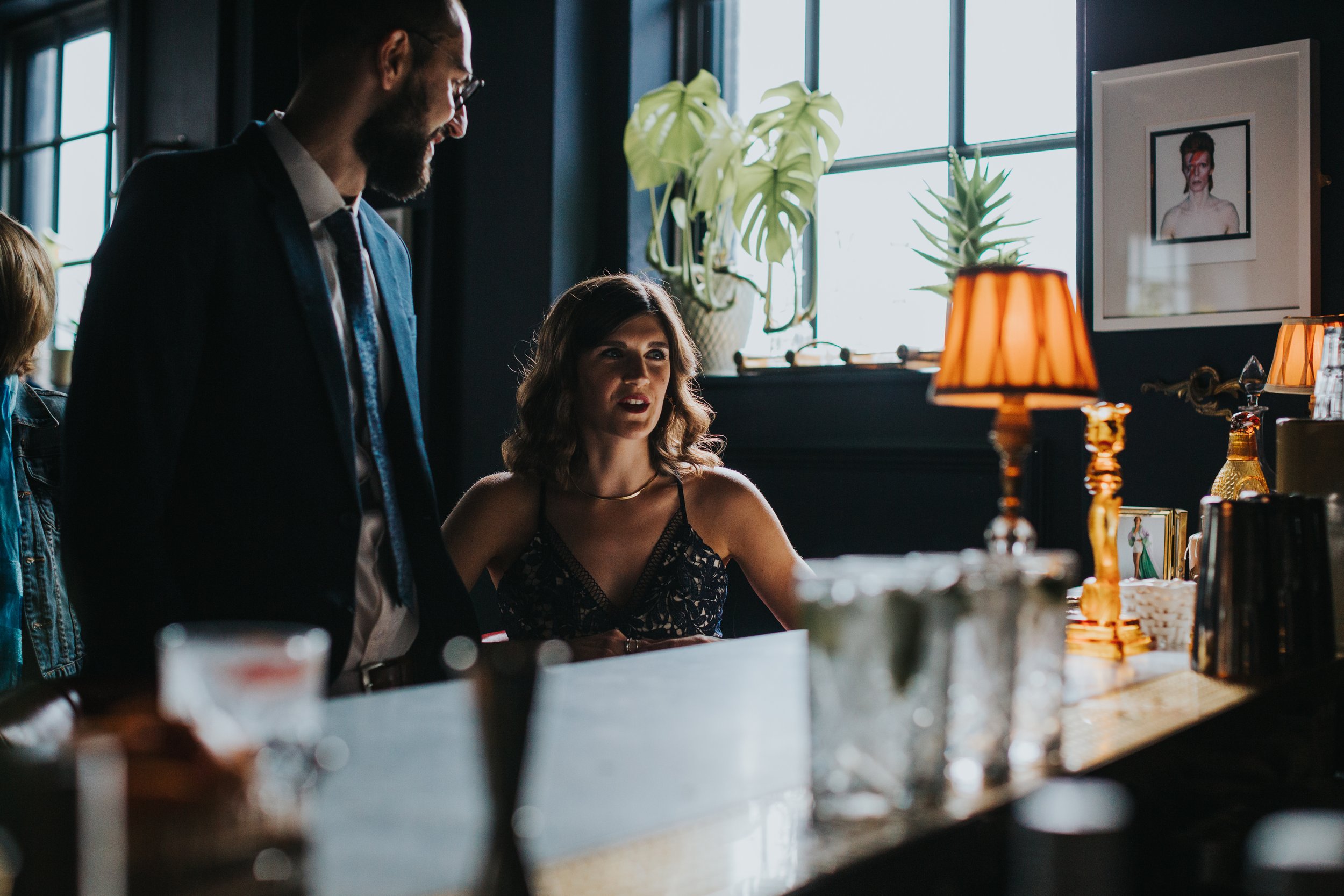 Guests ordering drinks. 