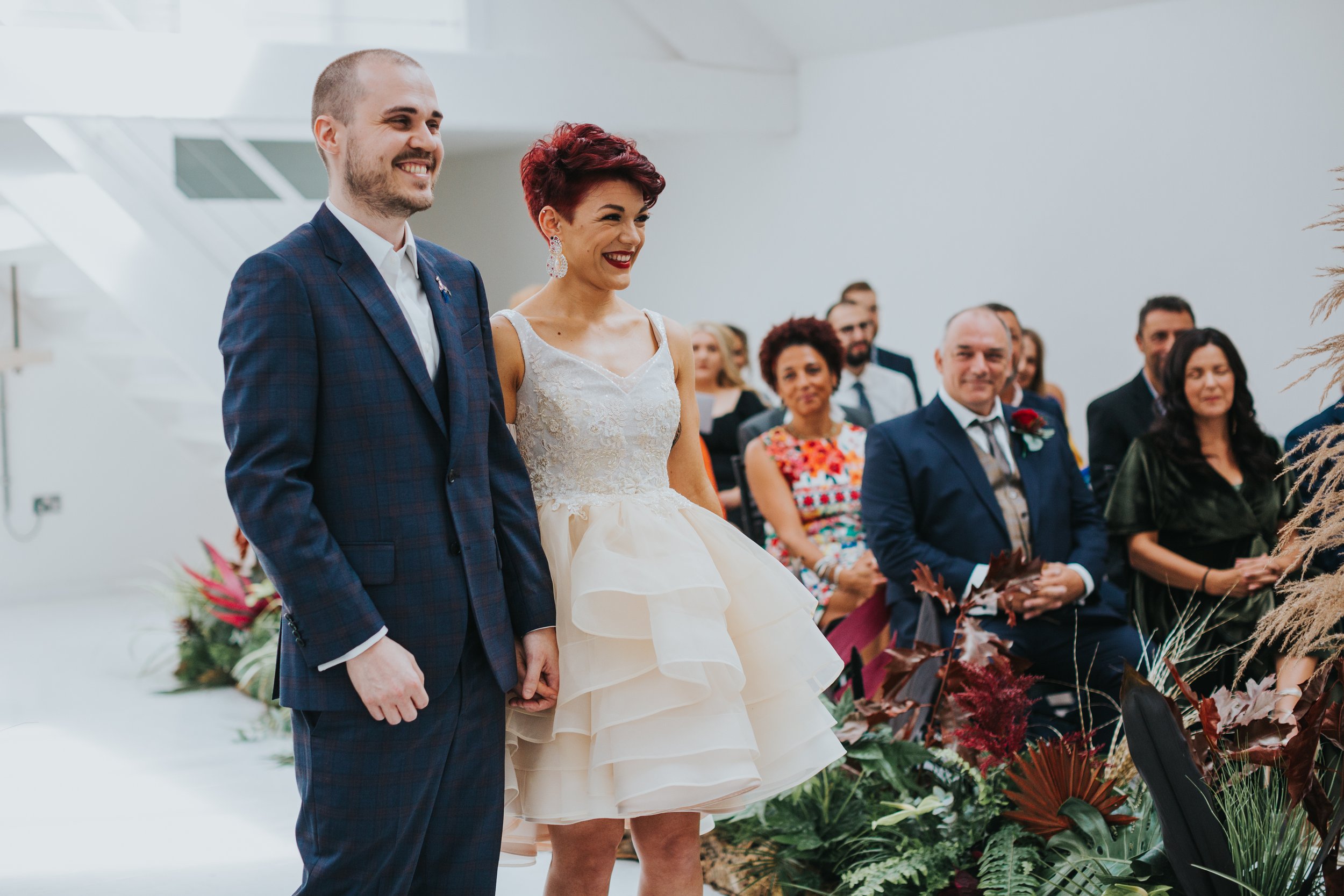 Bride and groom looking very happy about getting married. 