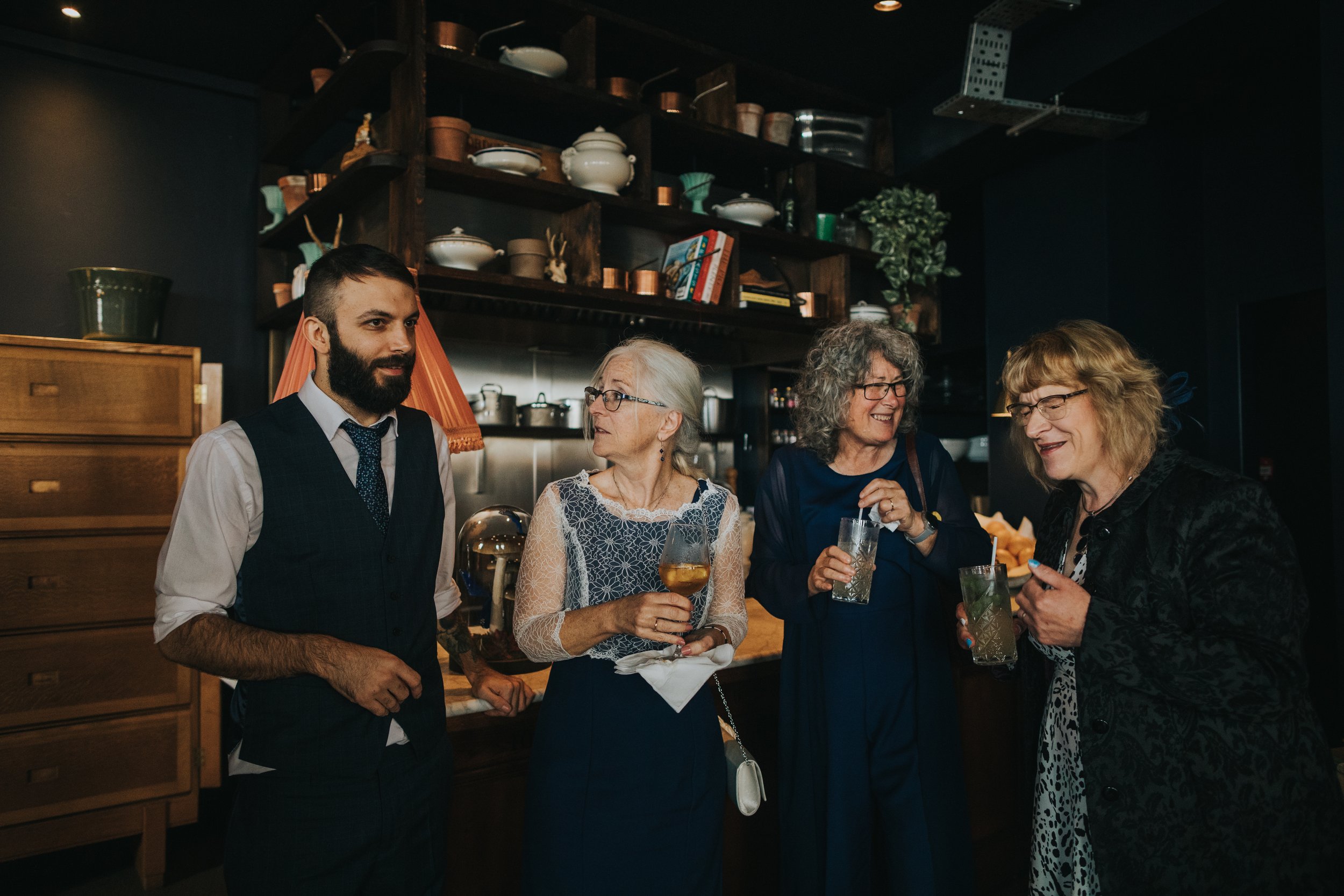 Grooms mum enjoys a cocktail