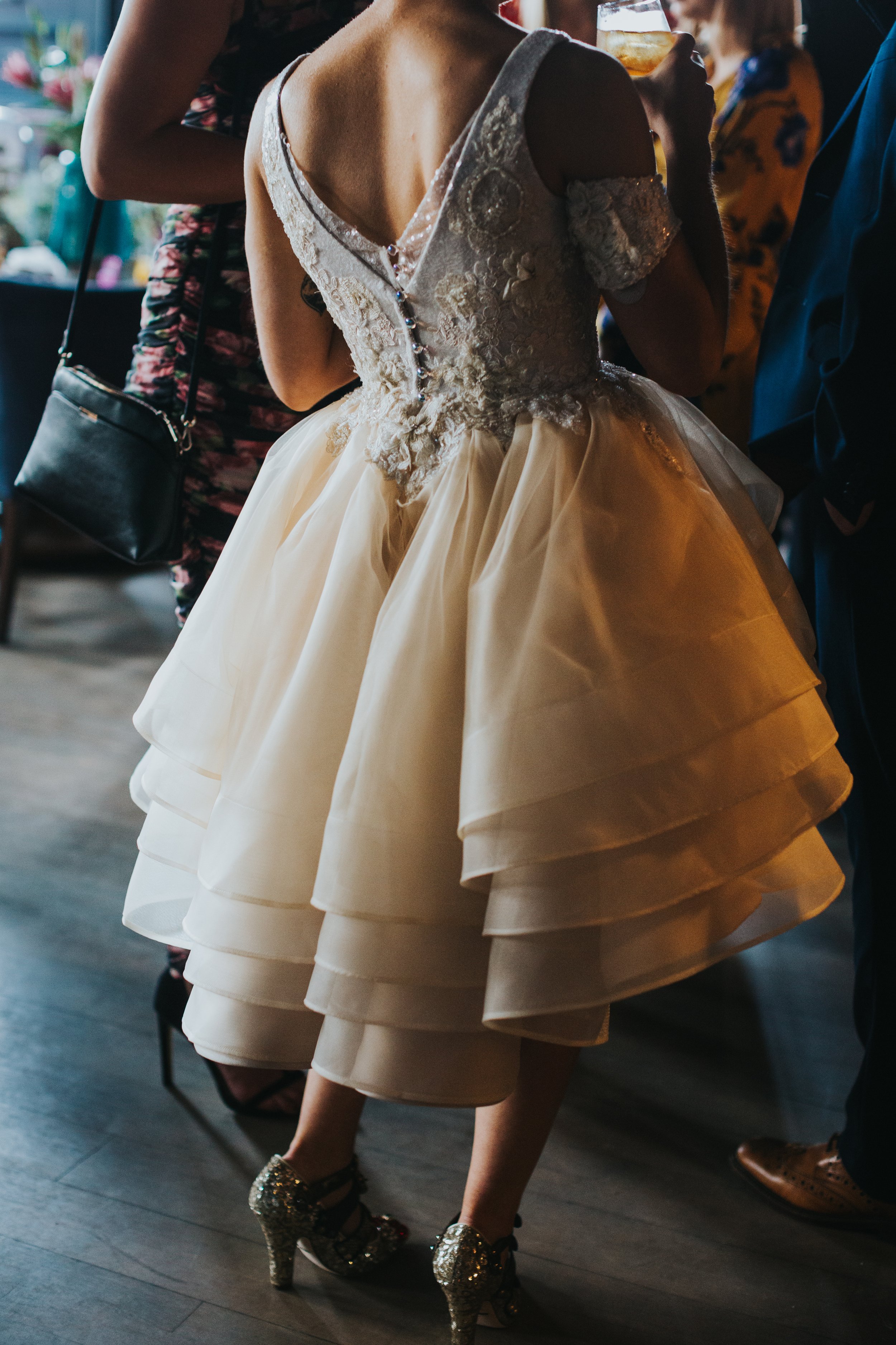 Beautiful wedding dress catches the light. 