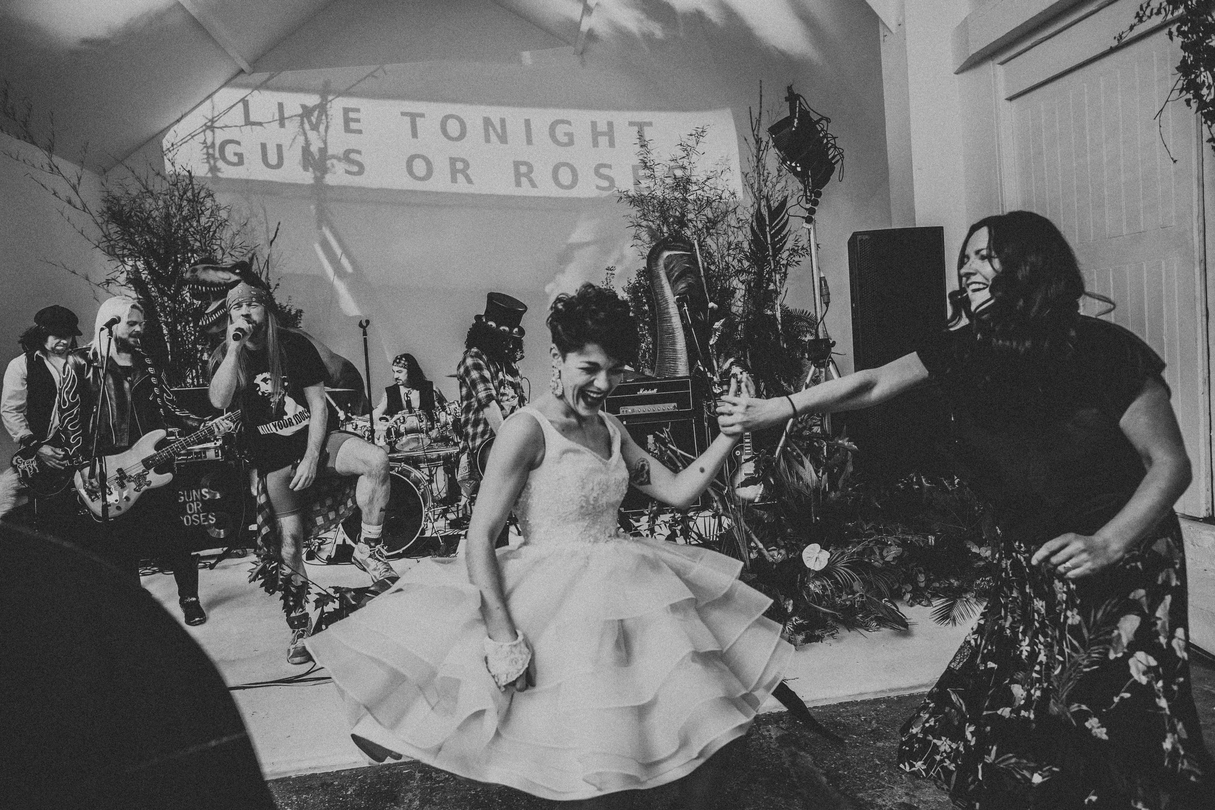 Bride dancing with her mother, photo in black and white. 
