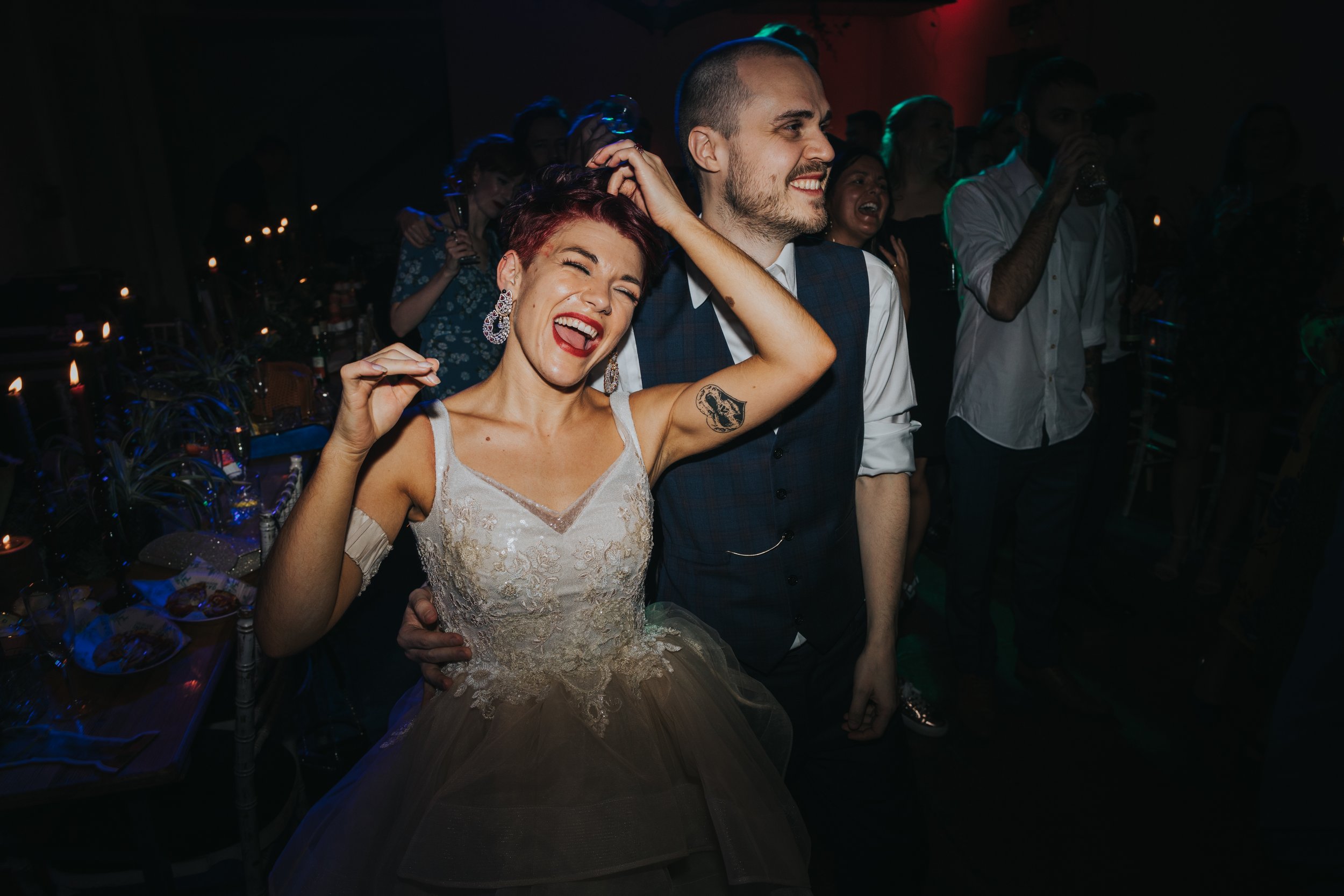 Bride and groom looking cool on the dance floor