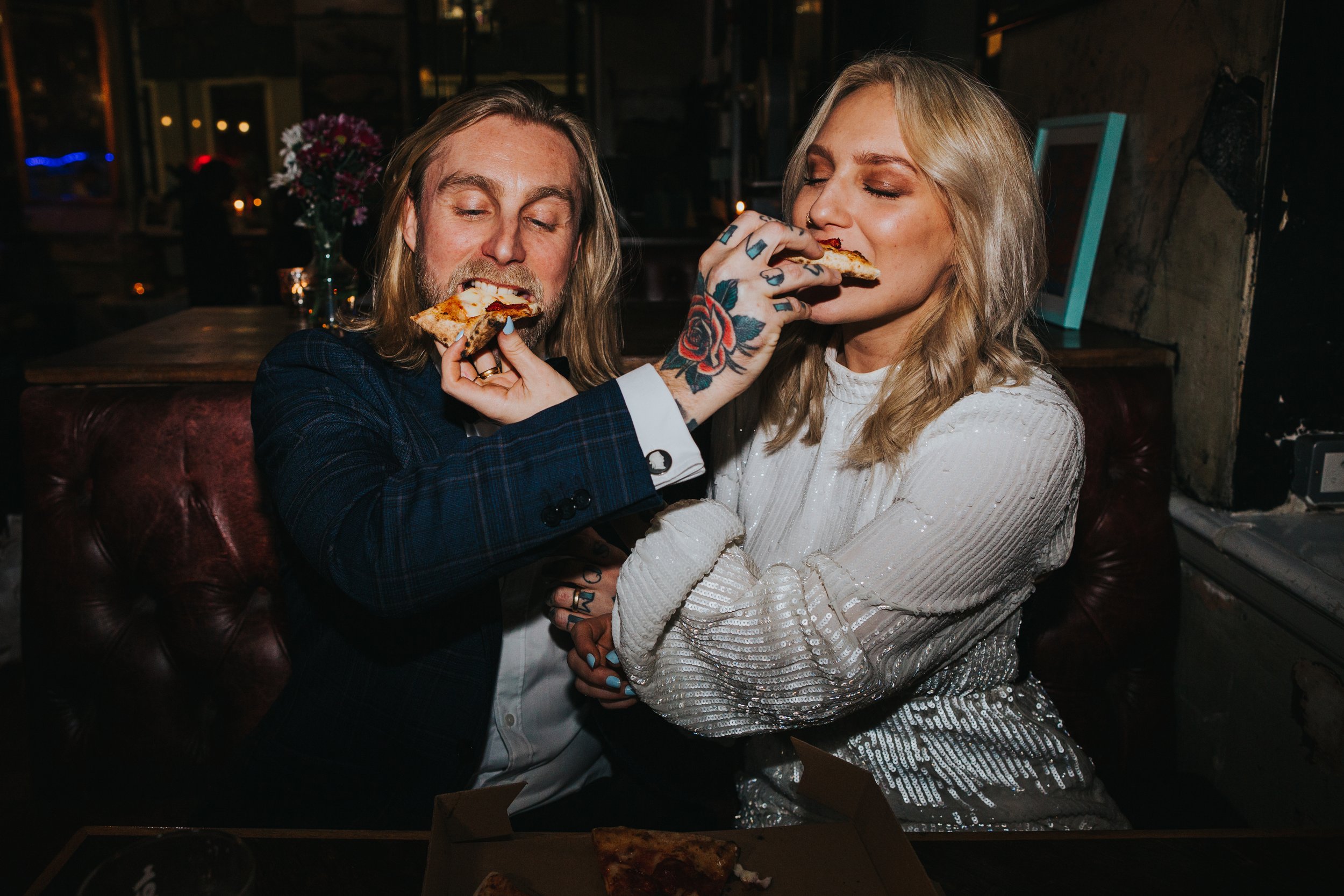 Couple in love with pizza. 