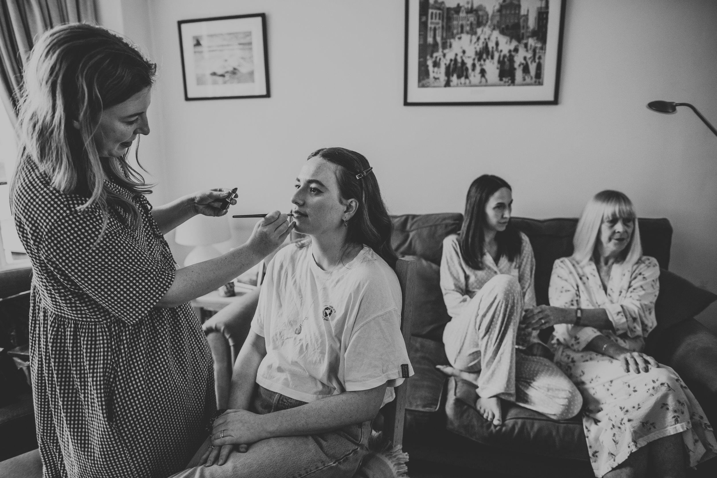 Bridesmaids getting their make up done.