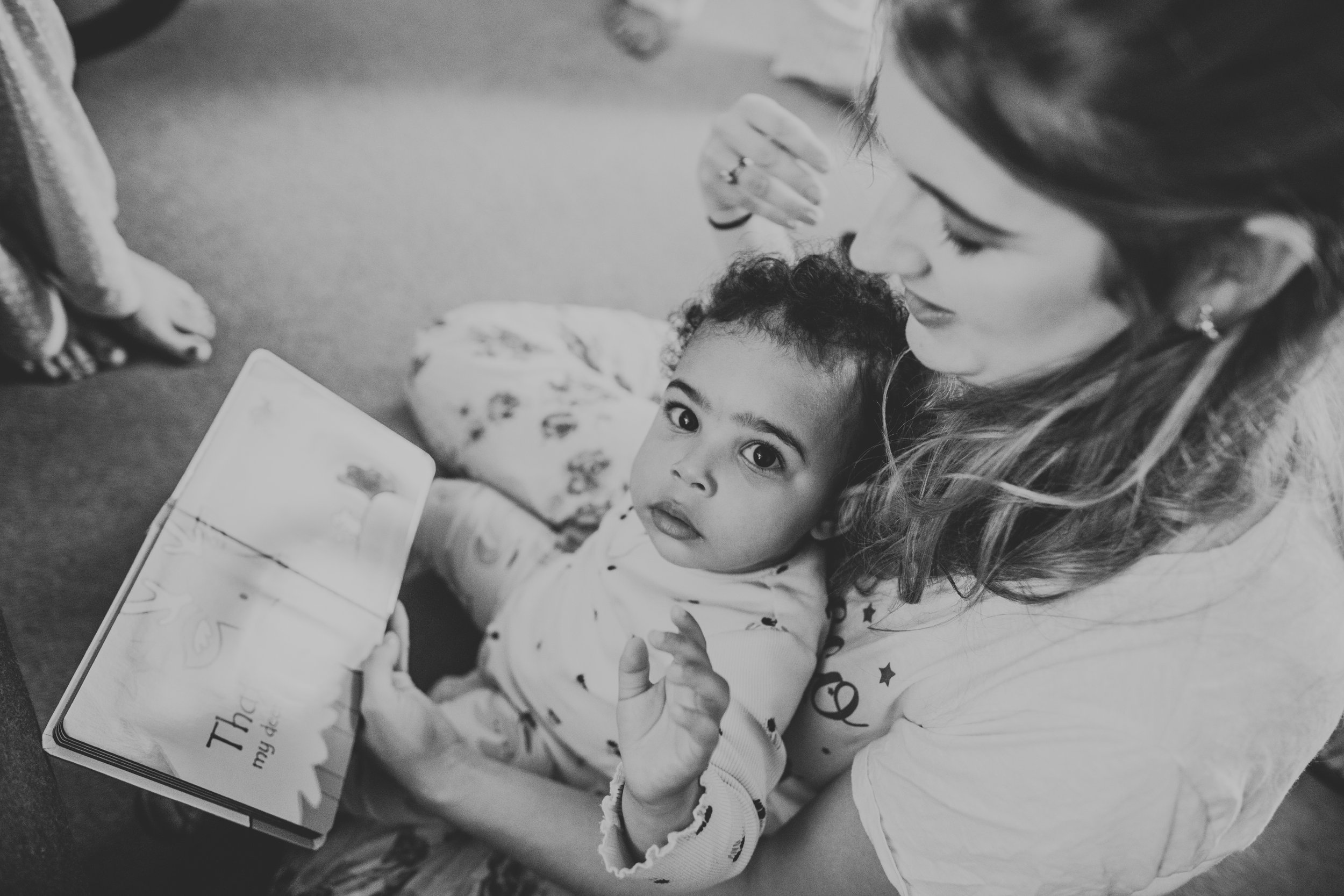 Bridesmaid reads child a story