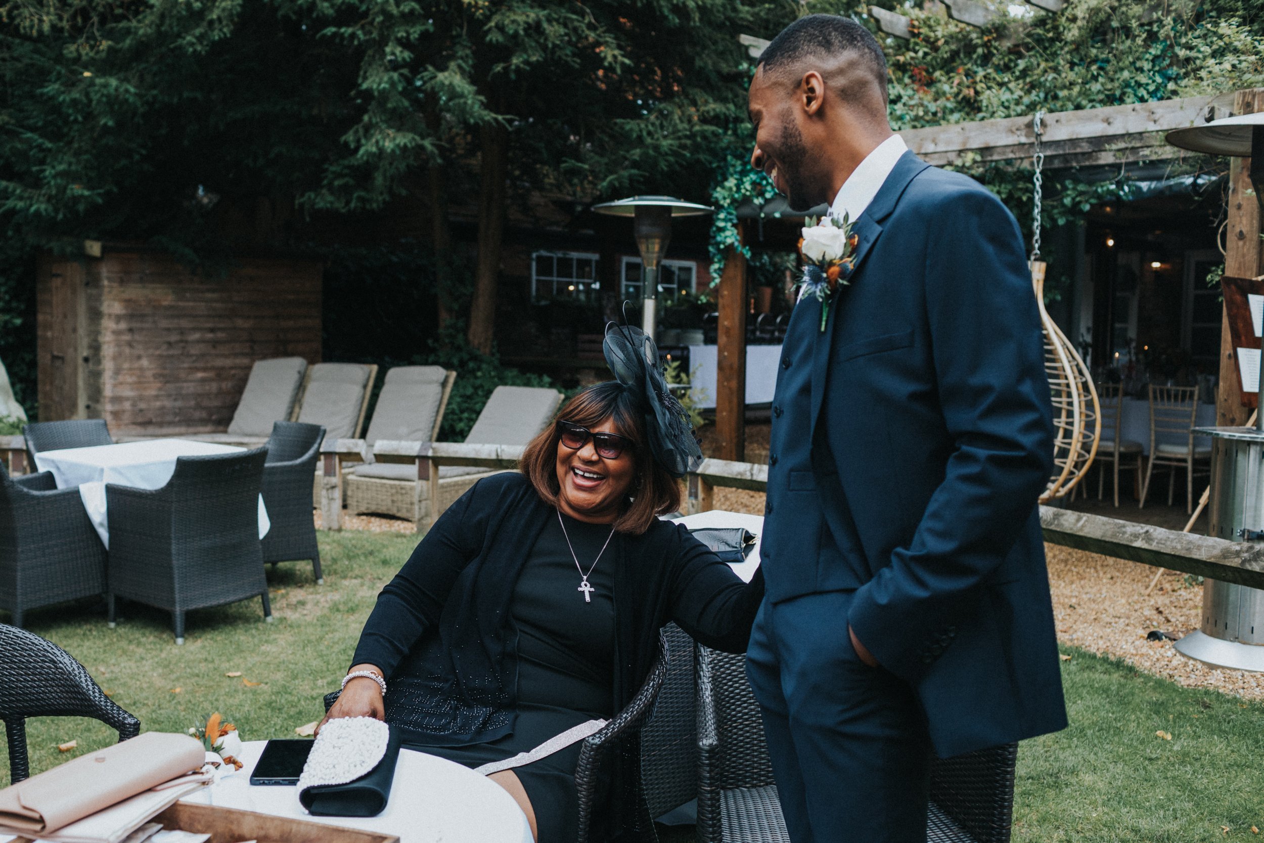 Wedding guest laughing. 