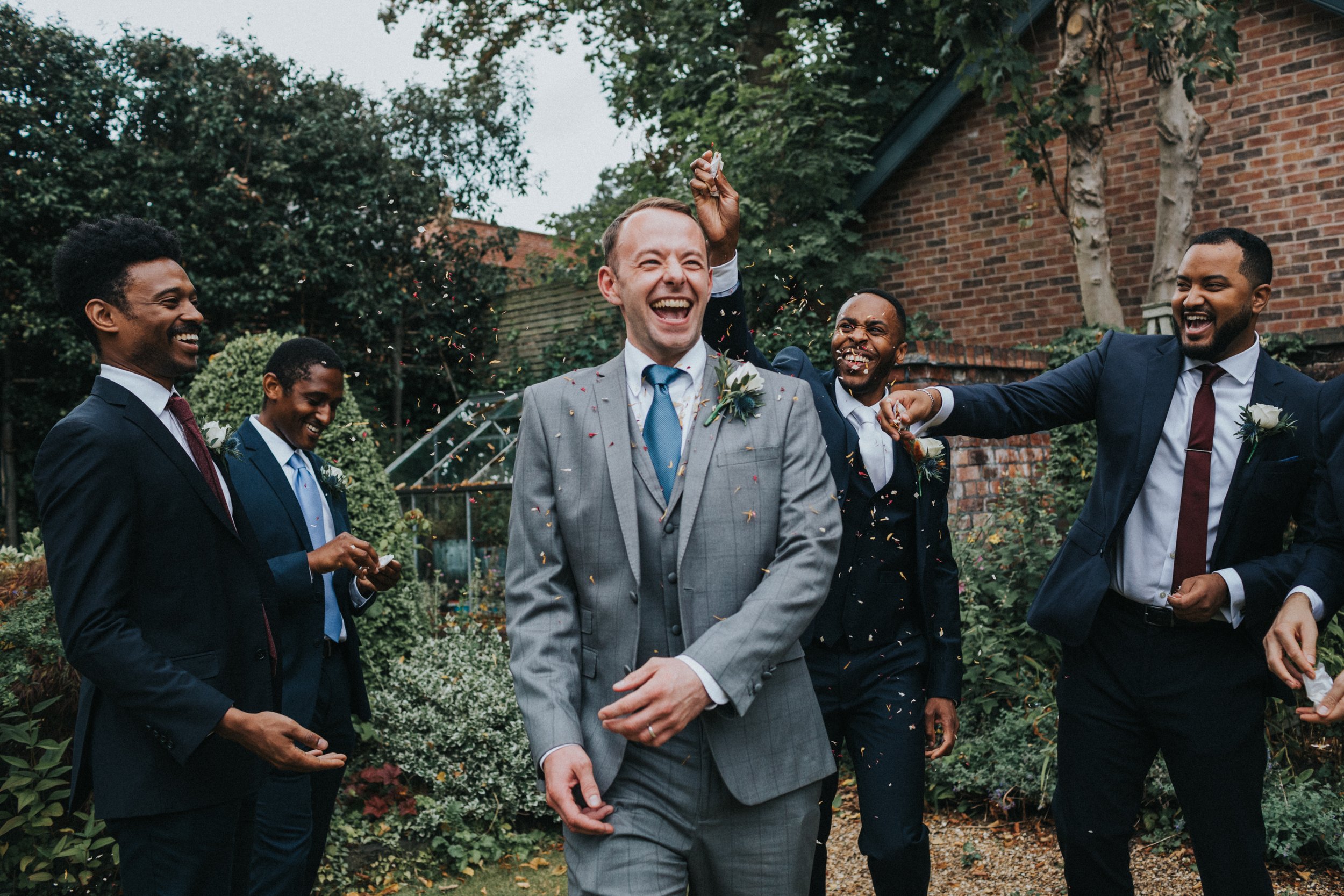 Best man laughing.