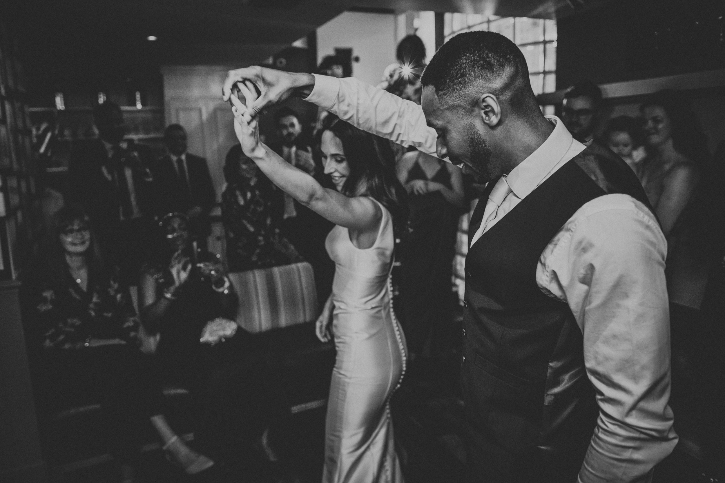 Groom gives his Bride a twirl. 