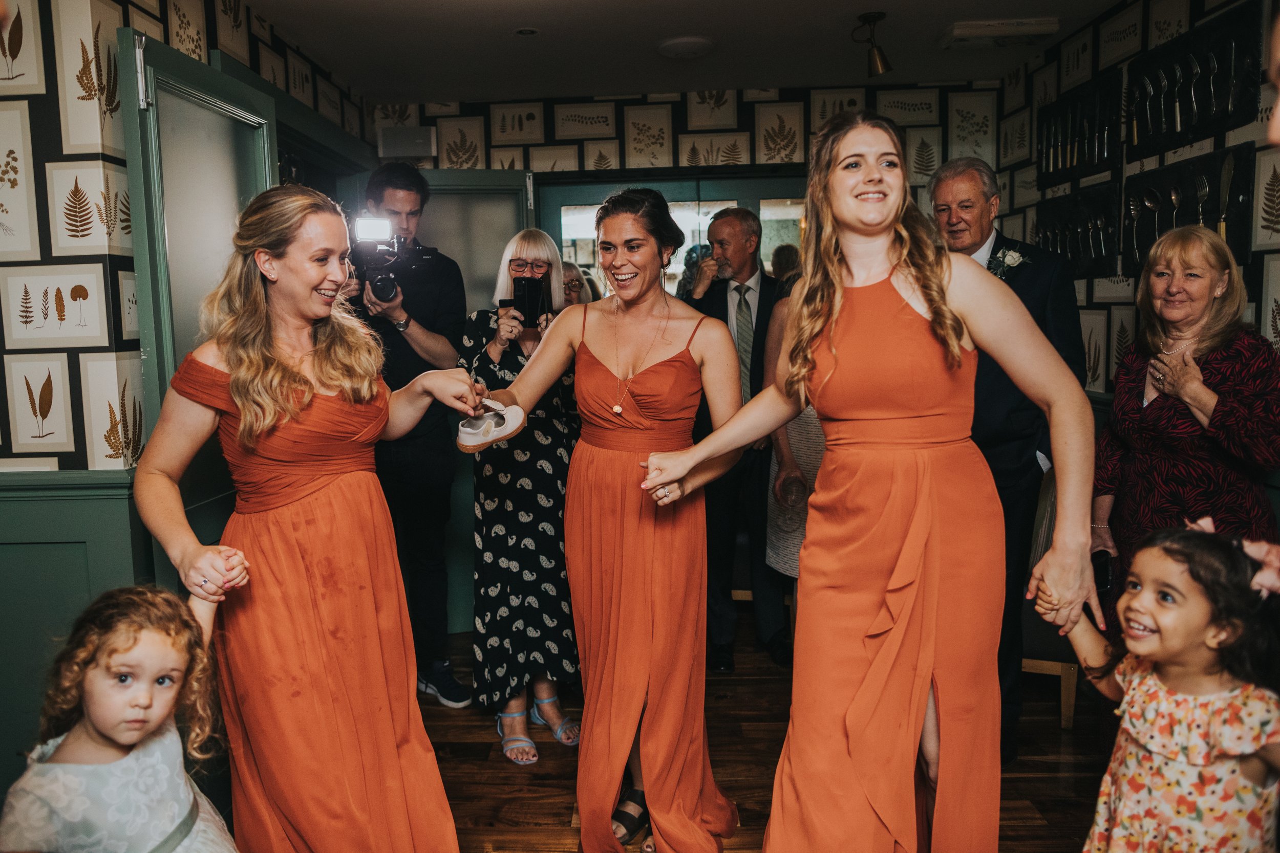 Bridesmaids dancing. 