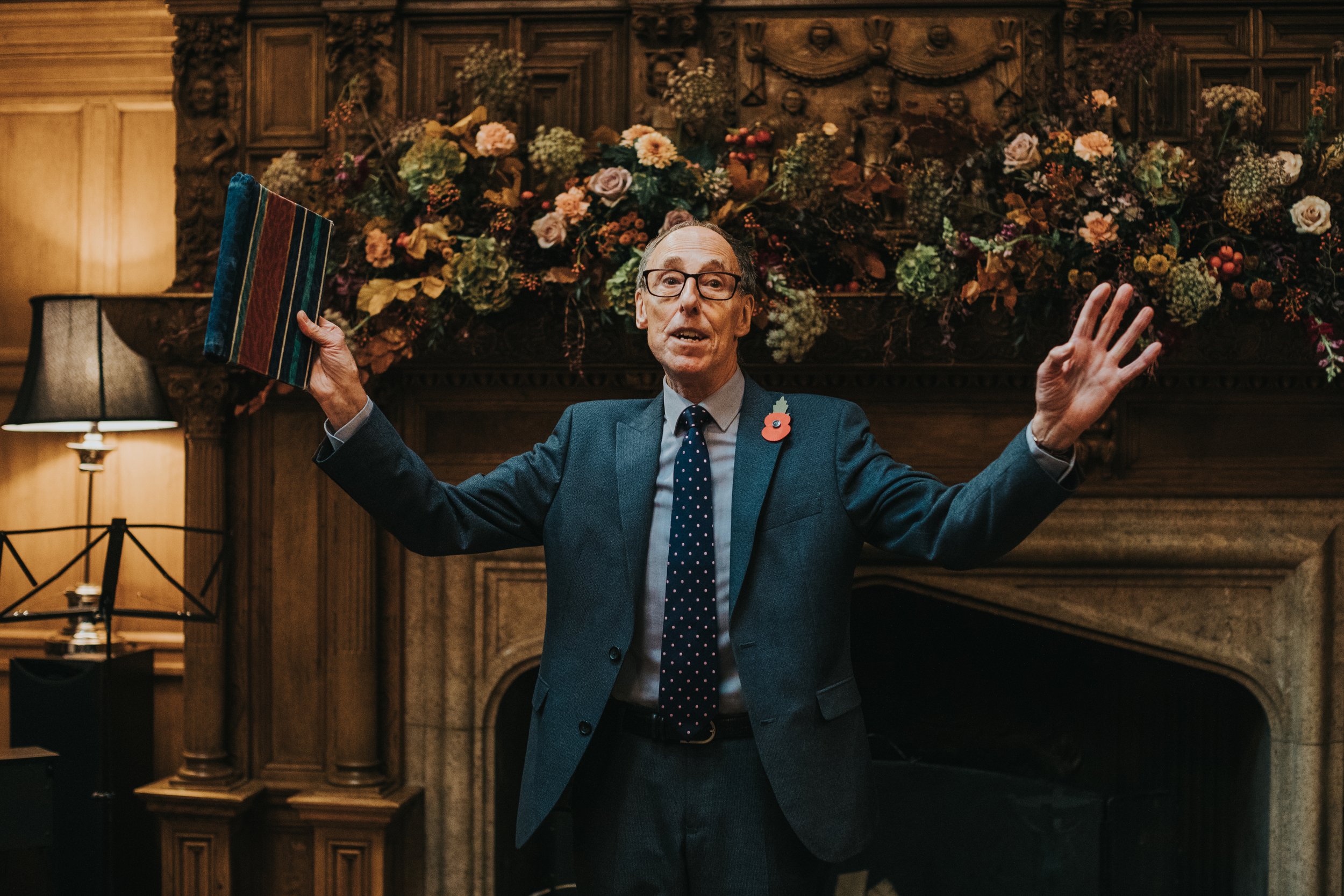 Master of ceremonies greets the wedding guests. 