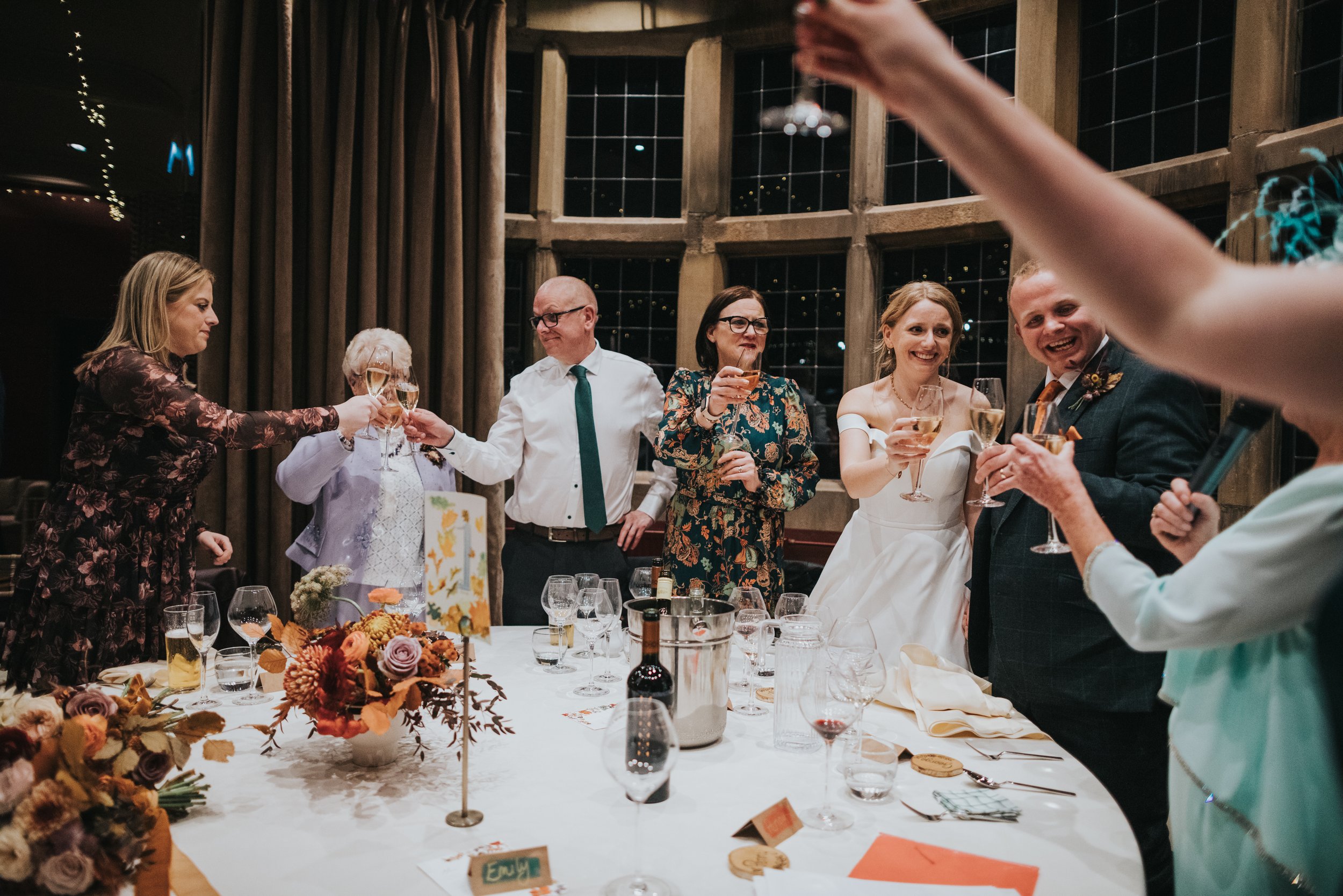 Head table cheers to the Mother of the Brides speech. 