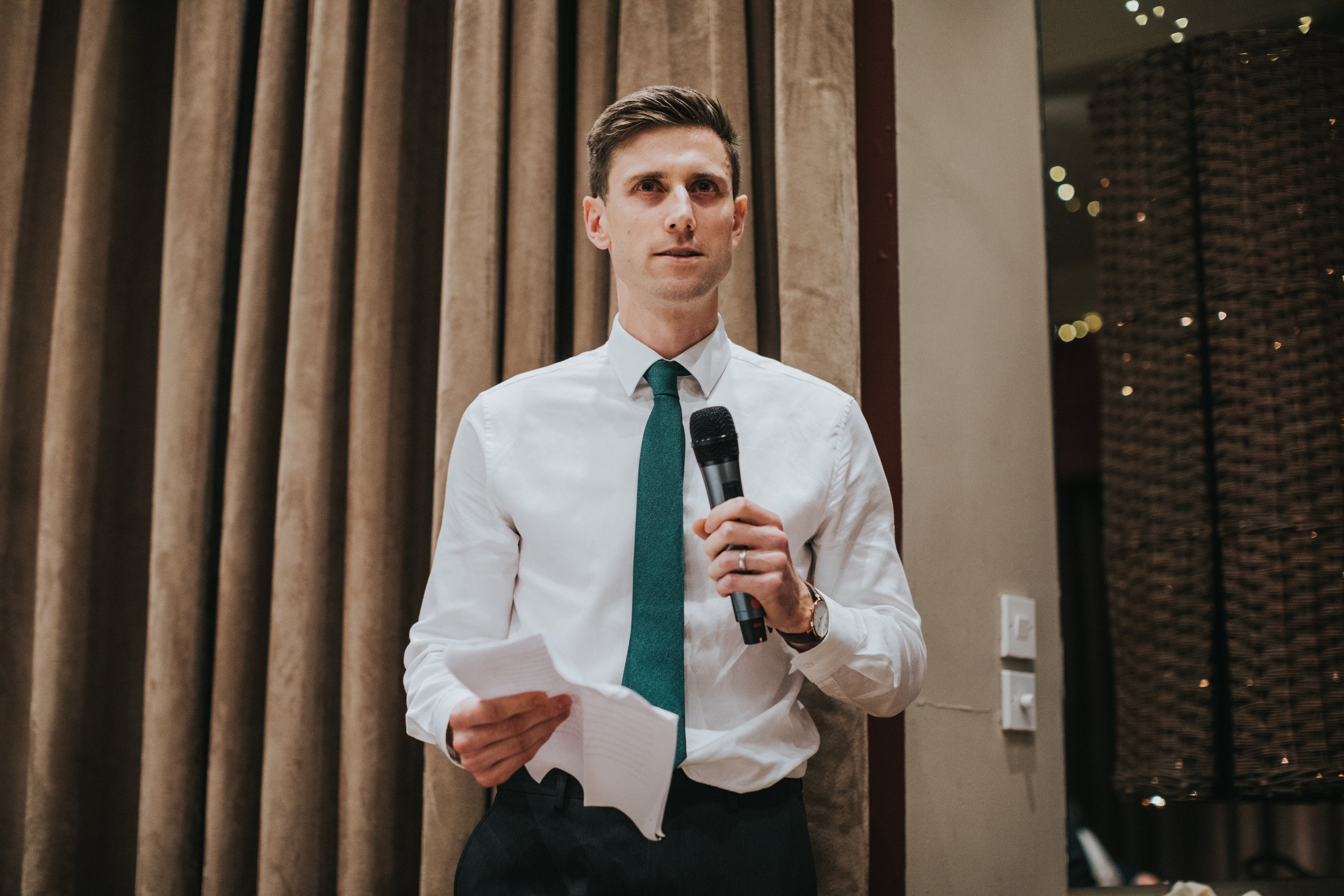 Best man gives his speech. 