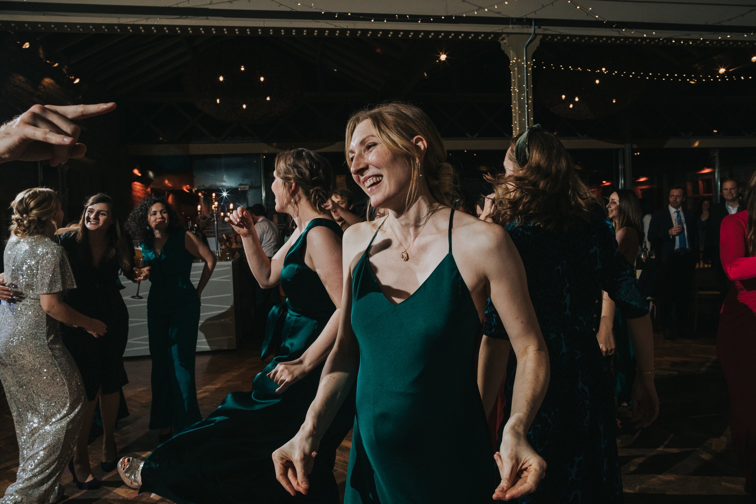 Bridesmaid dancing. 