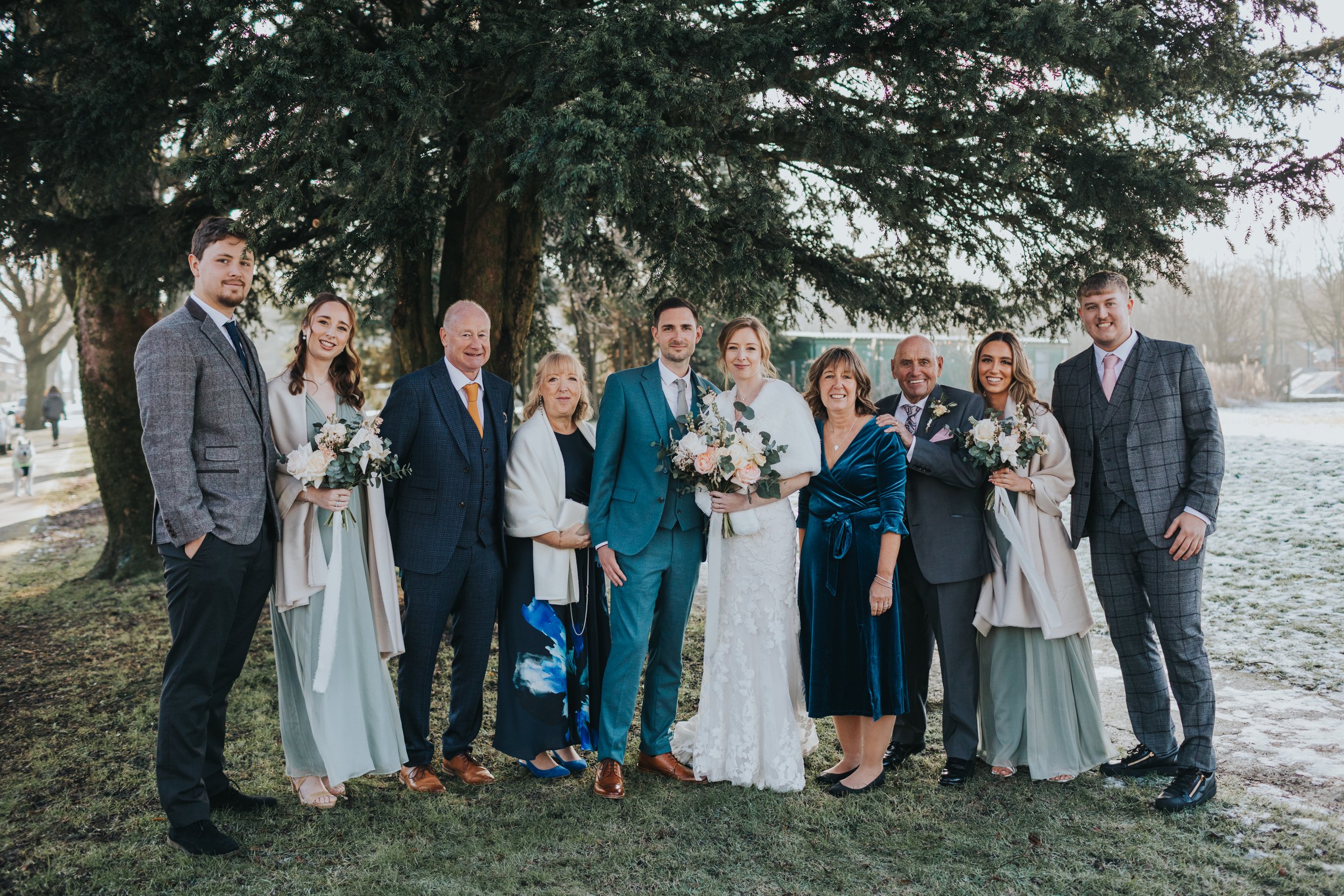 Family Photo underneath a Cedar tree. 