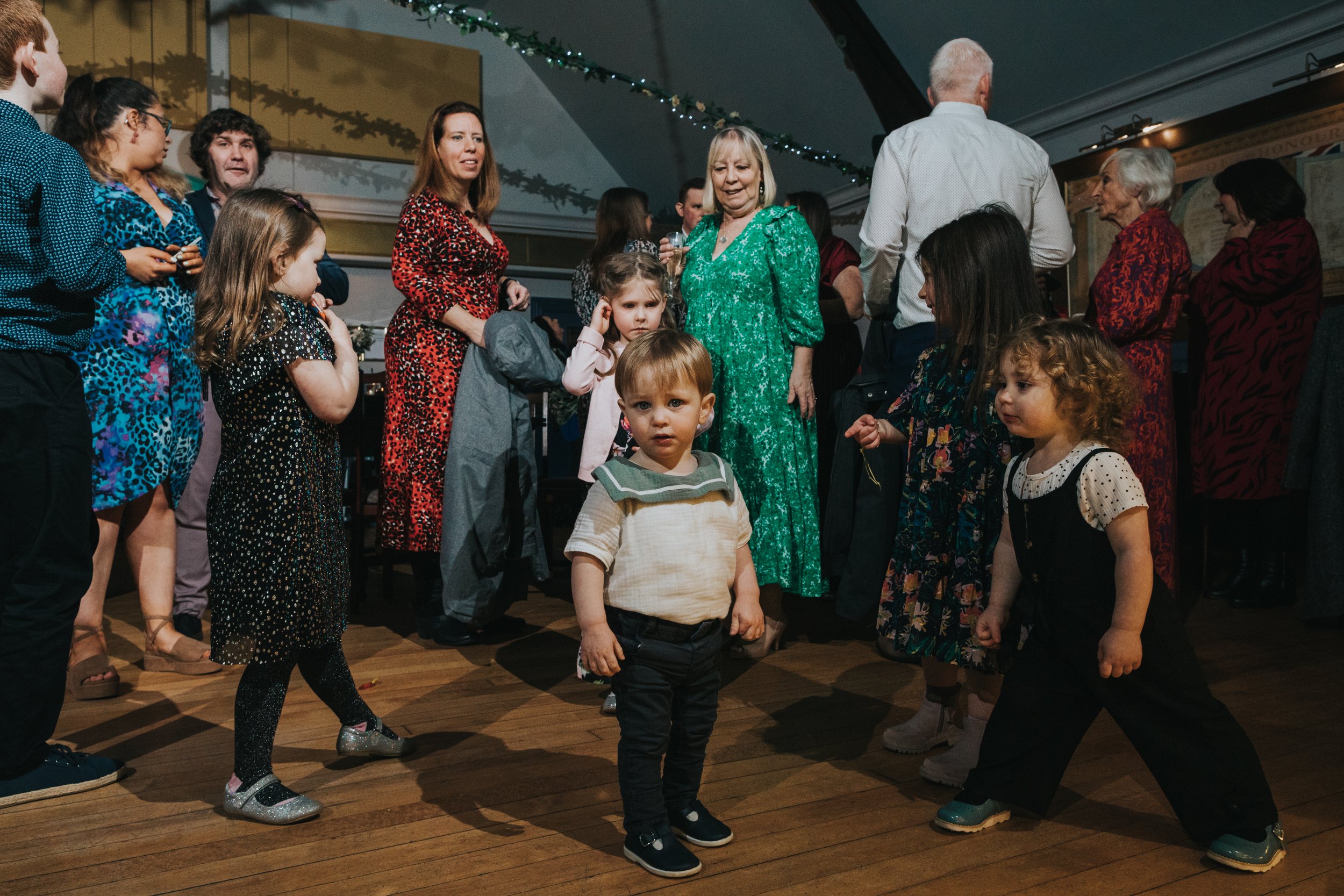 Children playing on dance floor. 