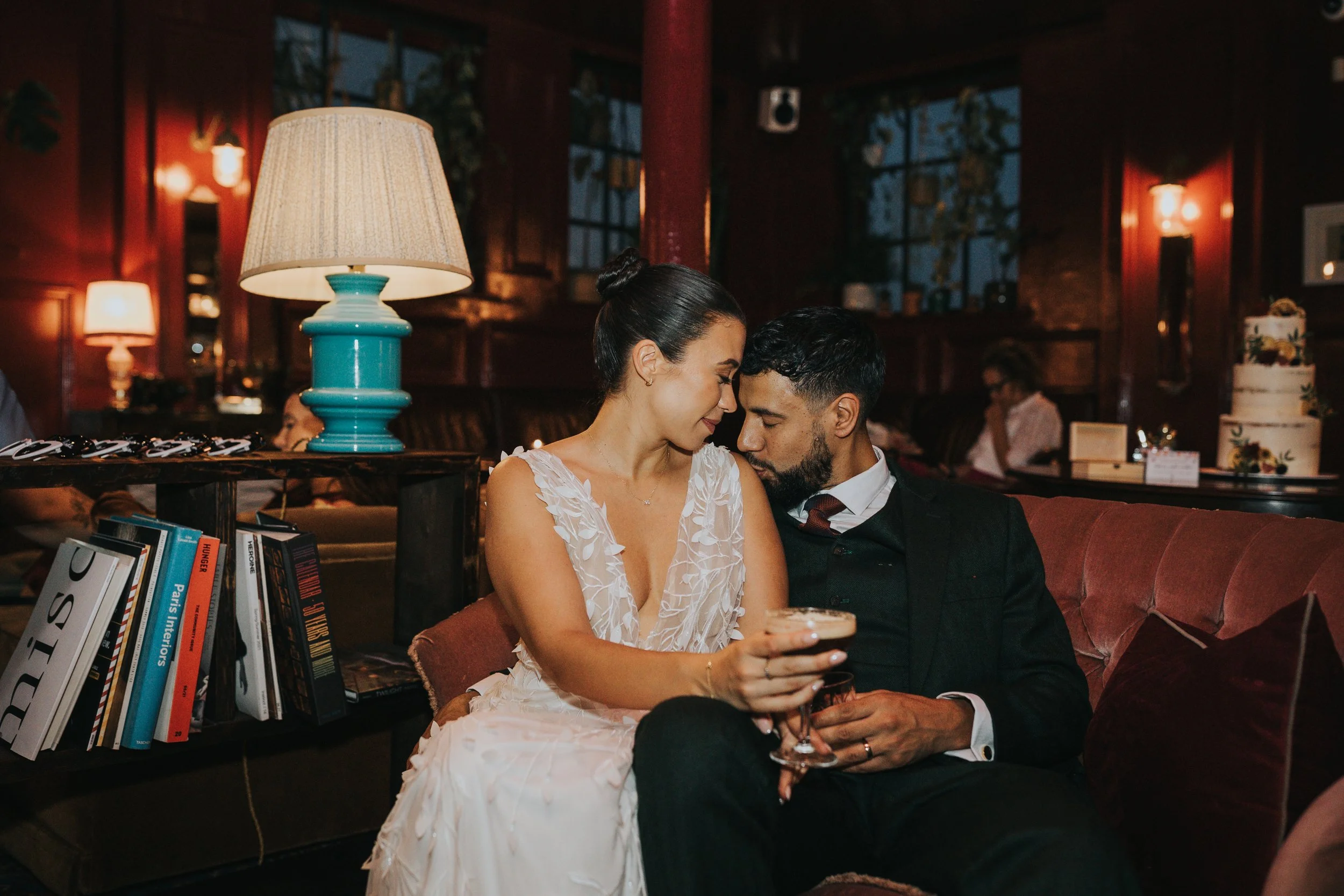 Bride and Groom share a quiet moment in the colourful Fivefour Studio Bar, Salford. 