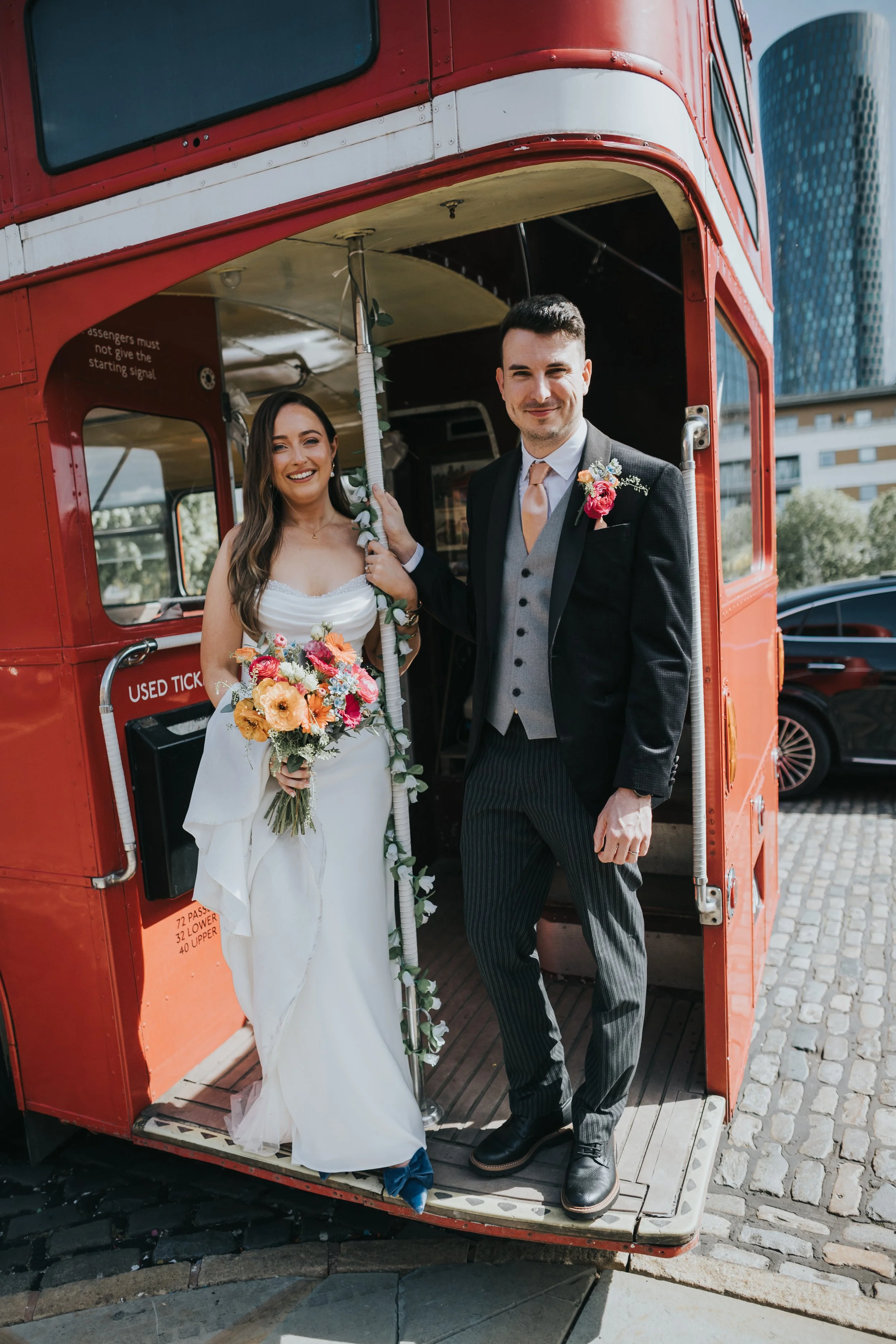 Bride and Groom on wedding bus. 