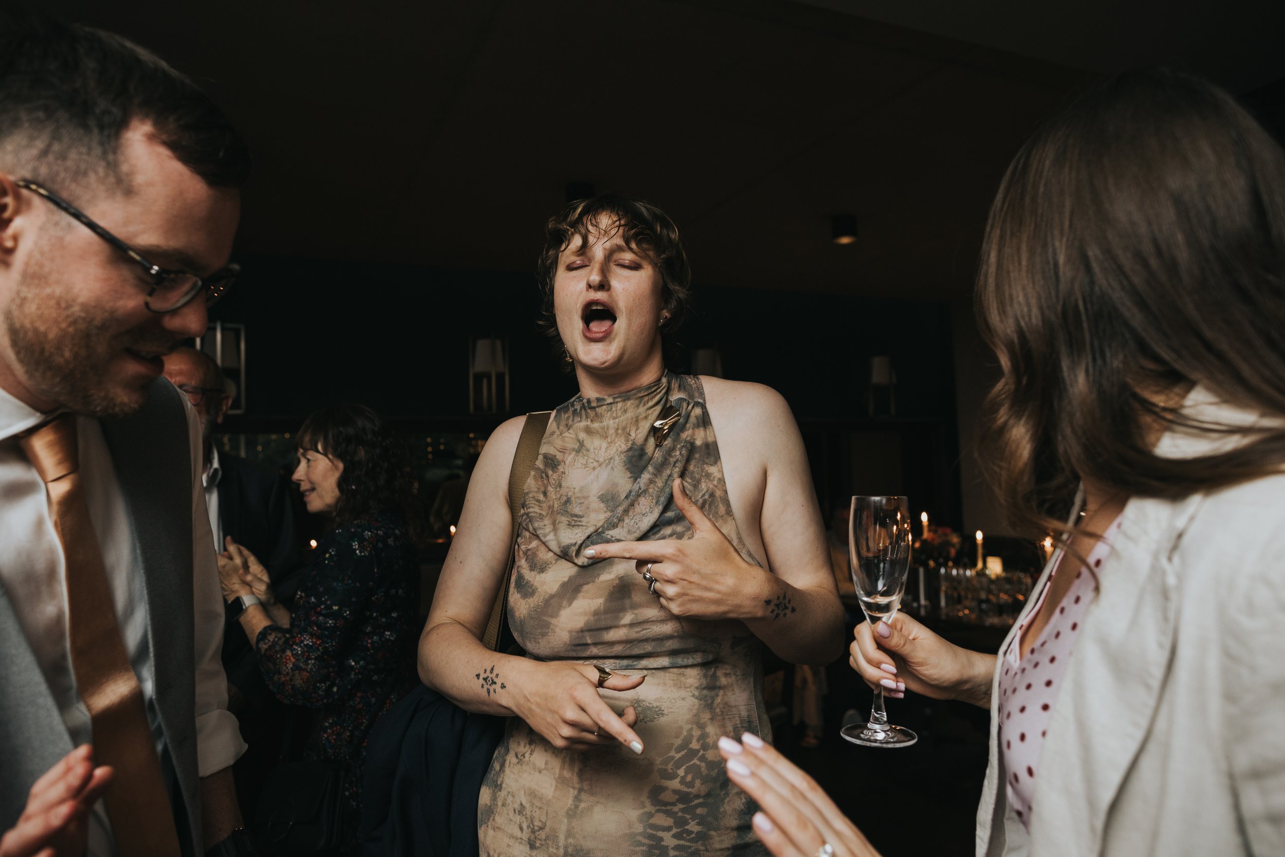 Wedding guest getting her groove on. 