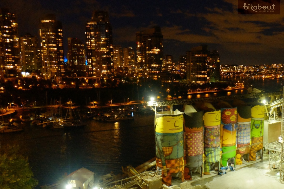 OSGEMEOS "Giants" mural is spectacular against city skyline at night