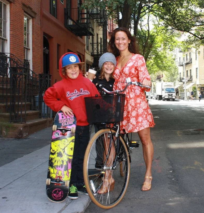 Lani Tarozzi, the route curator, pictured with her two sons who keep up with their mom by skateboarding alongside her.