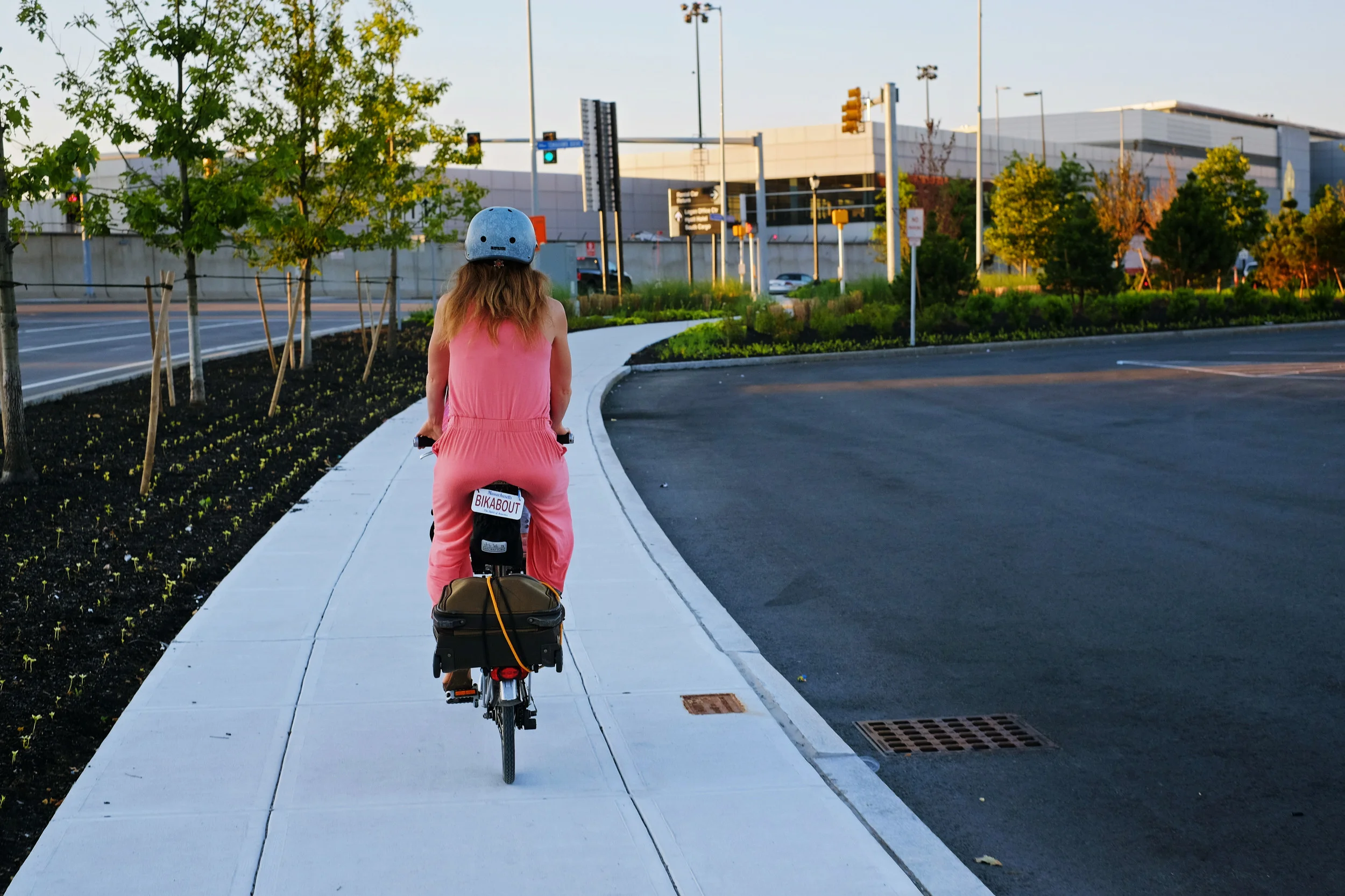 The Harborside Road sidewalks from the Greenway to terminal A: Wide, pristine, and devoid of foot-bound traffic. Giddyup!