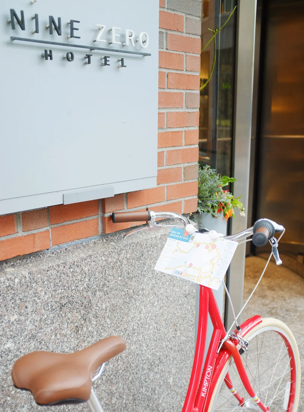Nine Zero Hotel's bikes with "Best of Boston by Bike" map mounted to the handlebars to make navigating easy.