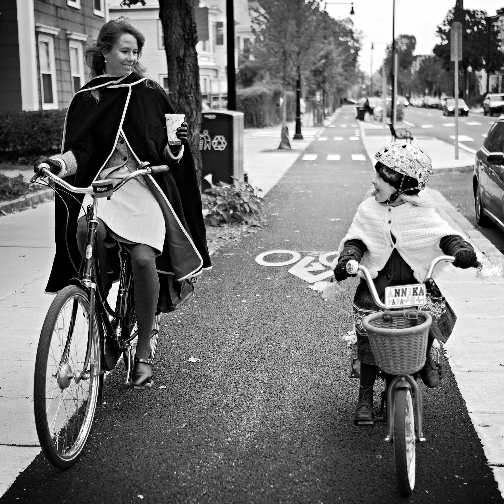 Bikabout-Boston-mother-daughter-biking-on-Western-Ave-cycle-track.JPG