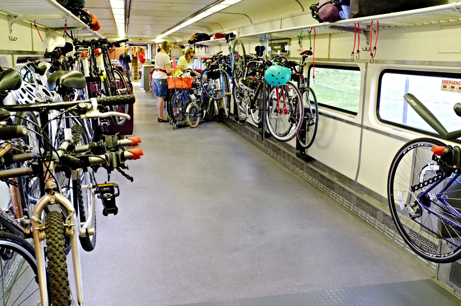 CapeFlyer's bike car is convenient for 3 reasons: 1) roll-on from the platform (no lifting), 2) floor and hanging bike storage and 3) IT'S NEXT TO THE BAR CAR!