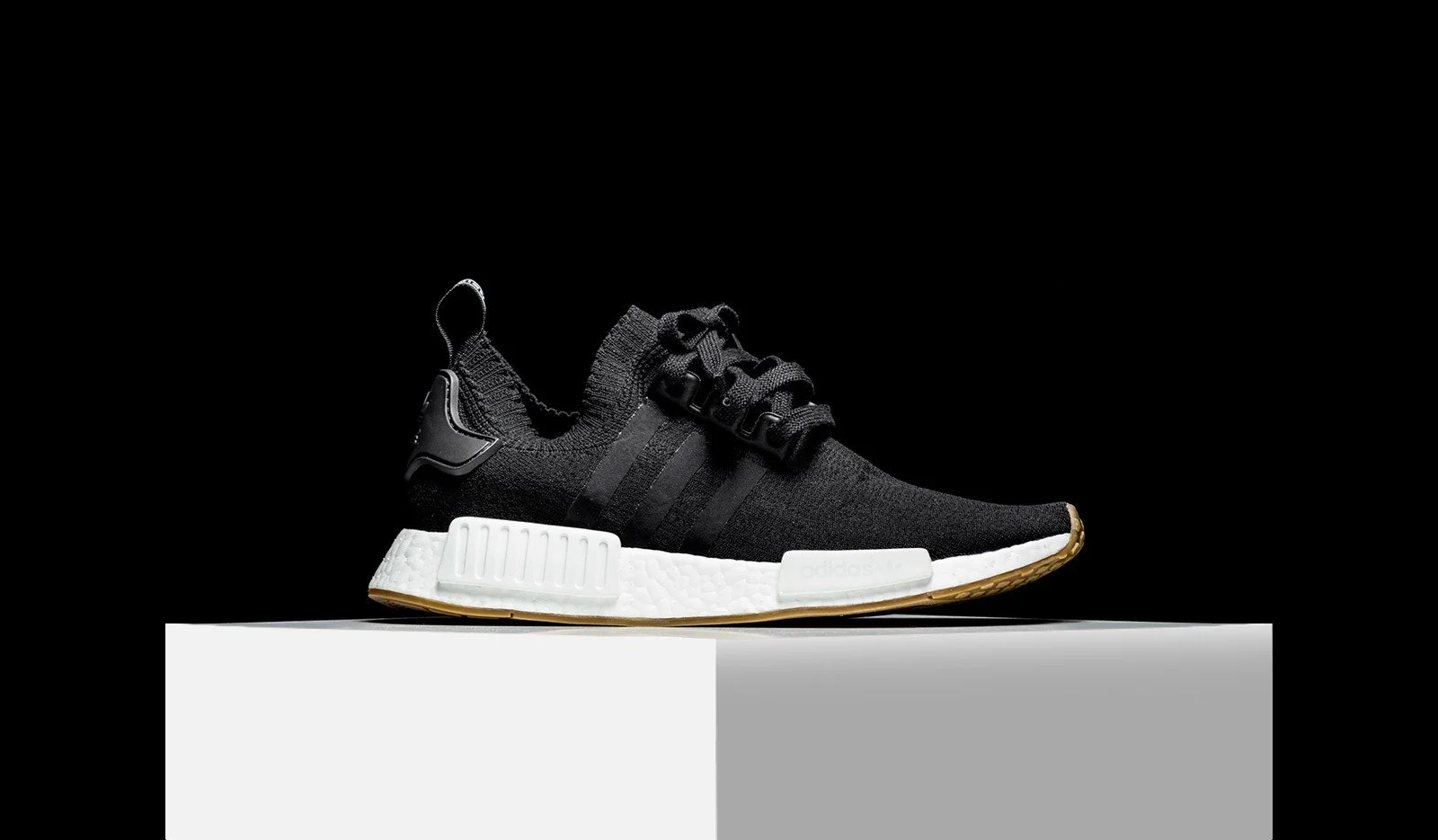 nmd r1 primeknit black gum